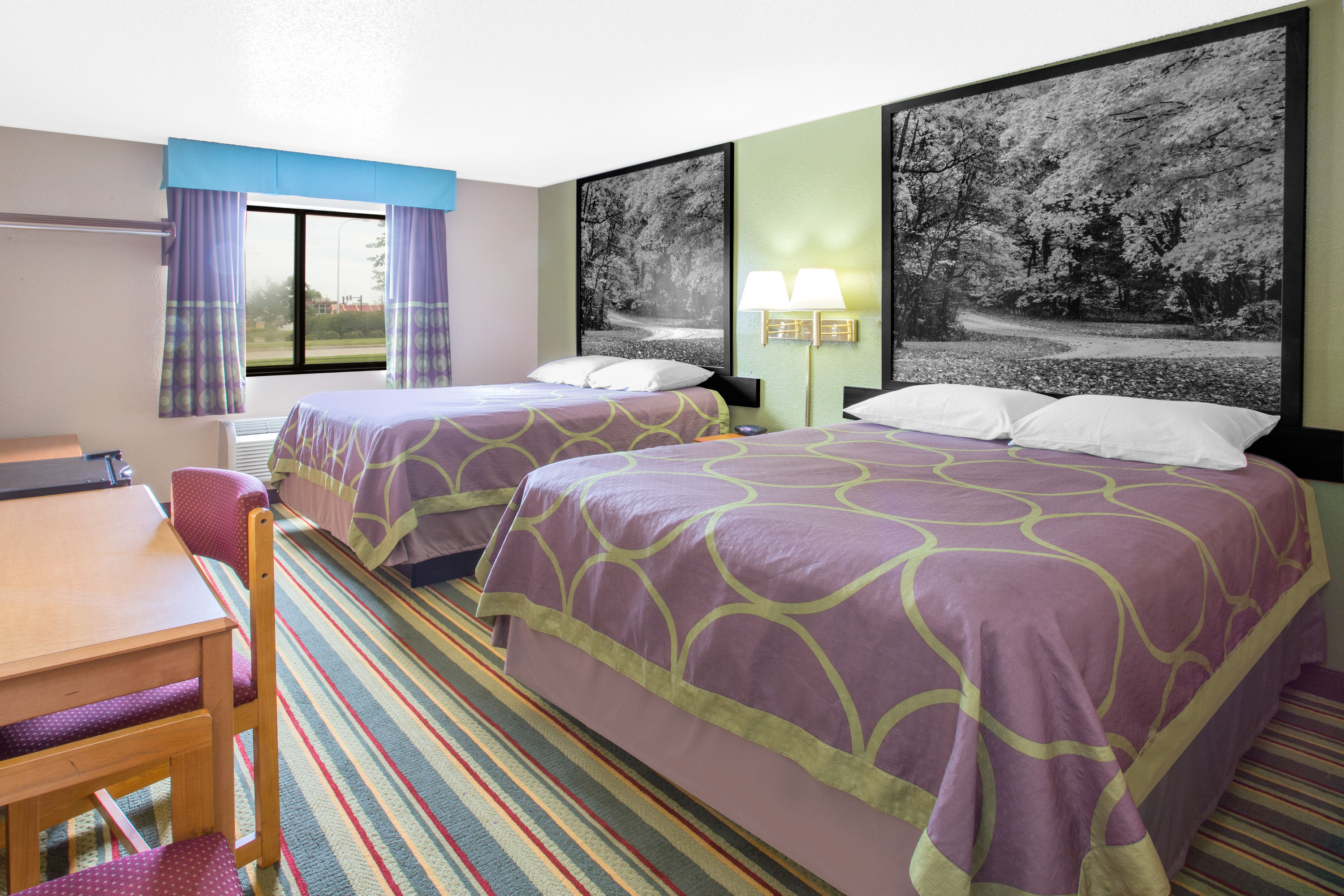 Guest room at the Super 8 by Wyndham Champaign in Champaign, Illinois