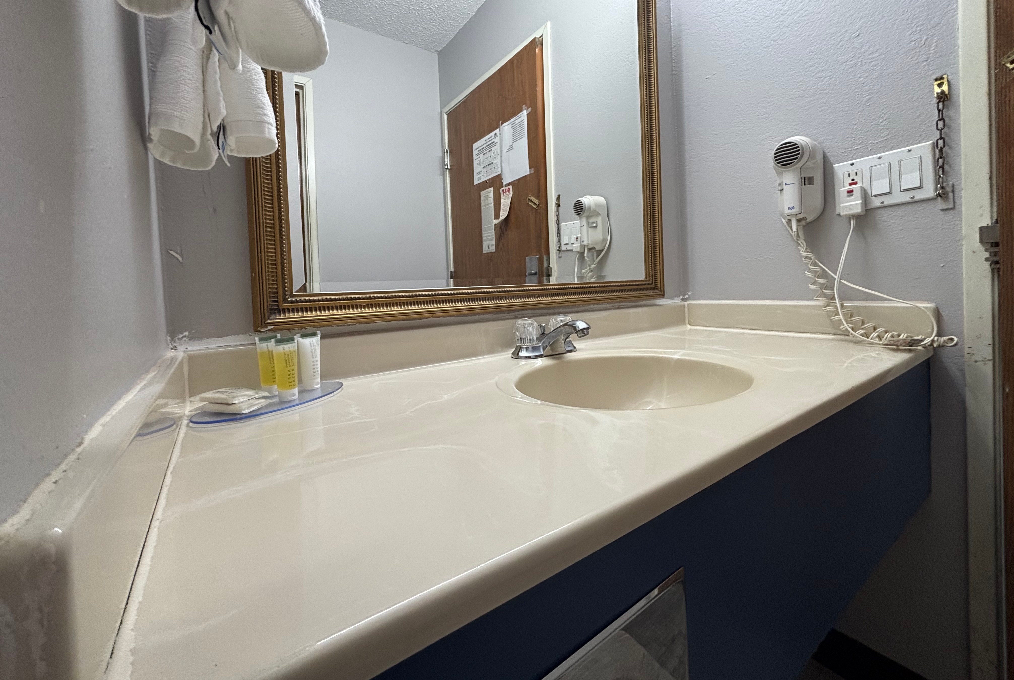 Guest room bath at the Super 8 by Wyndham Chenoa in chenoa, Illinois