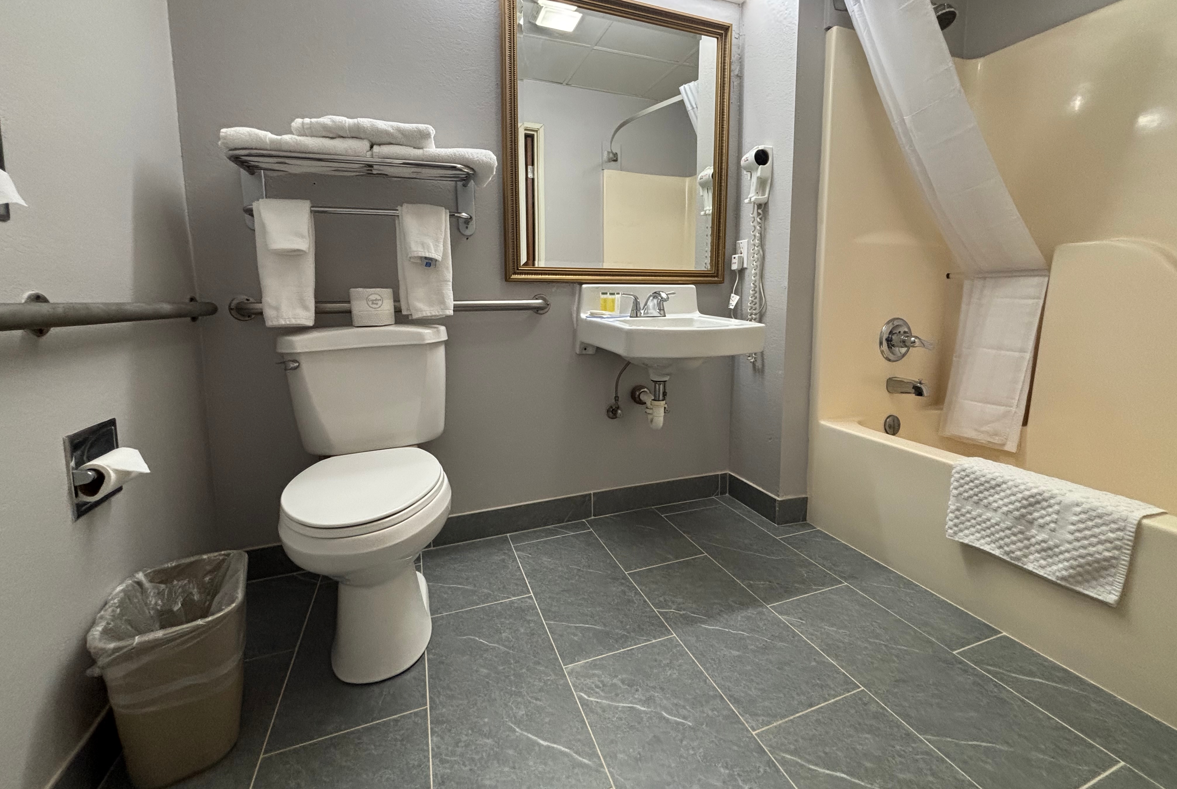 Guest room bath at the Super 8 by Wyndham Chenoa in chenoa, Illinois