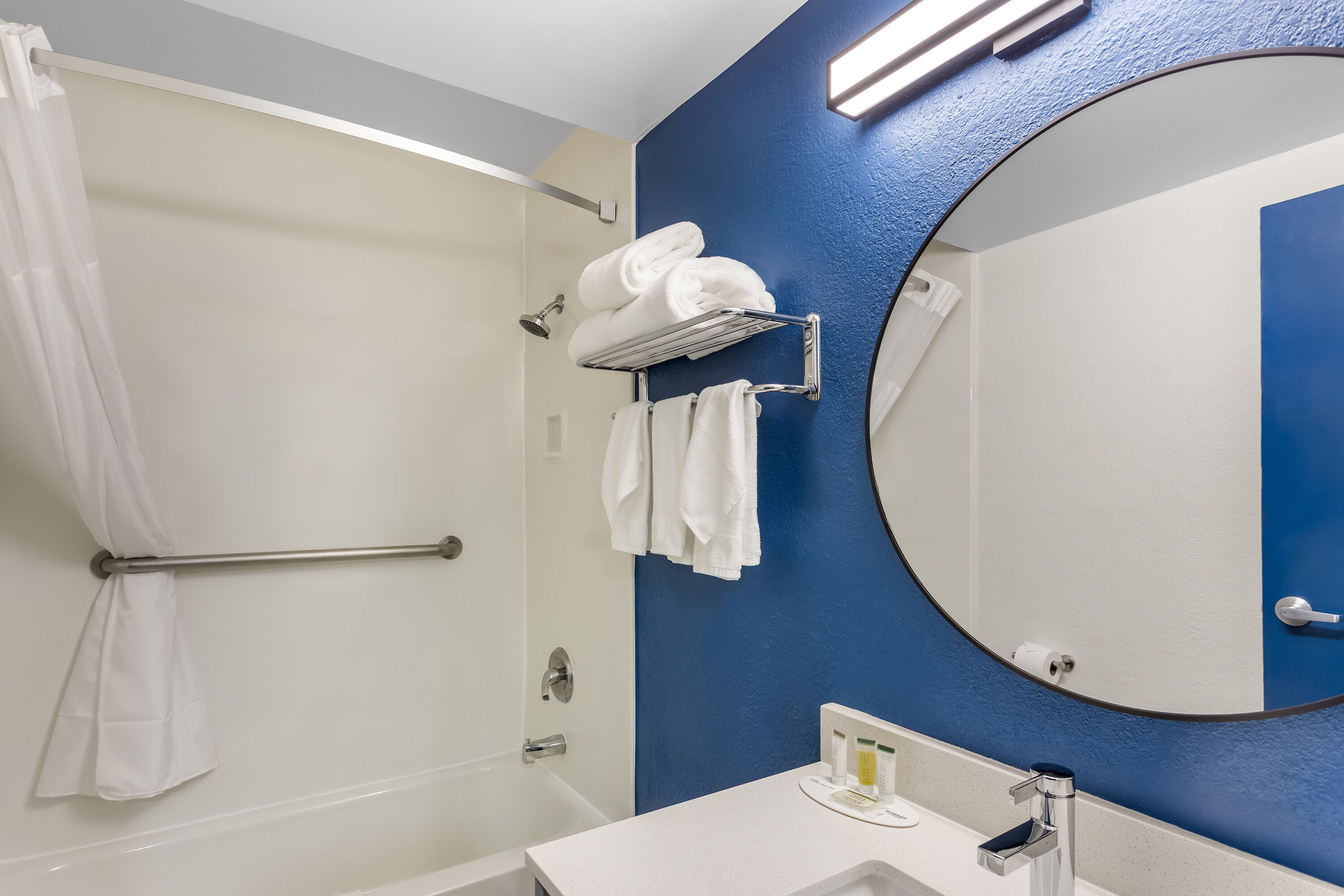 Guest room bath at the Super 8 by Wyndham Chicago IL in Chicago, Illinois
