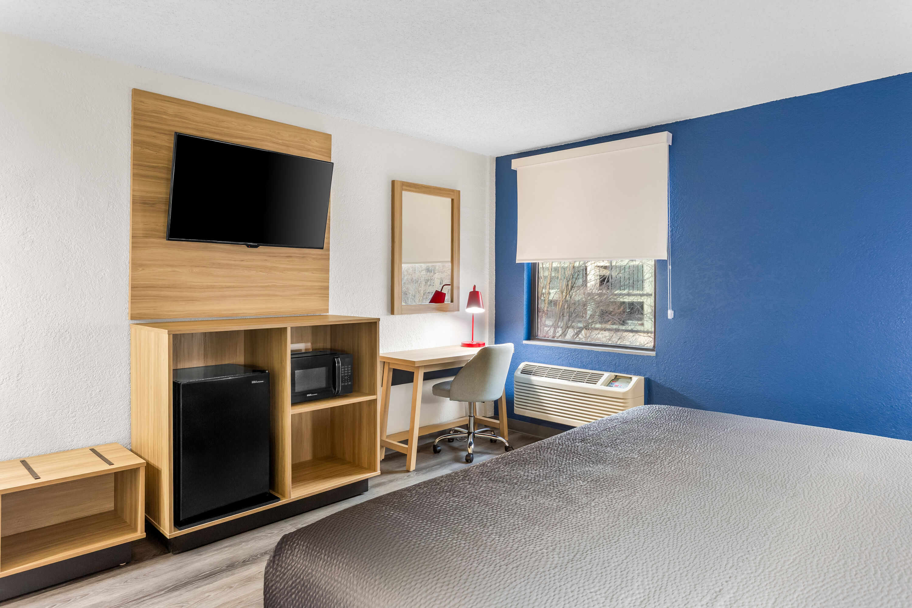 King bed guest room at the Super 8 by Wyndham Chicago IL in Chicago, Illinois