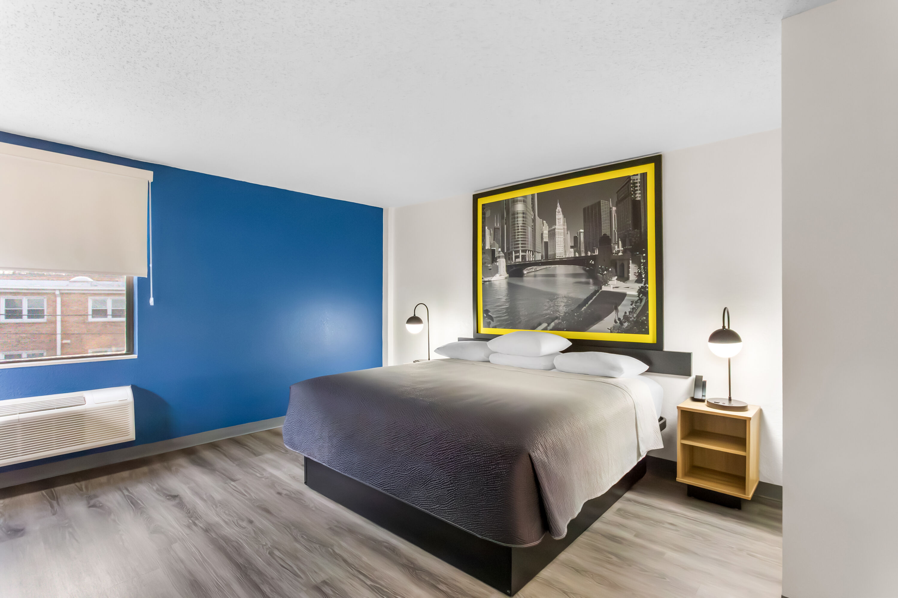 King bed guest room at the Super 8 by Wyndham Chicago IL in Chicago, Illinois