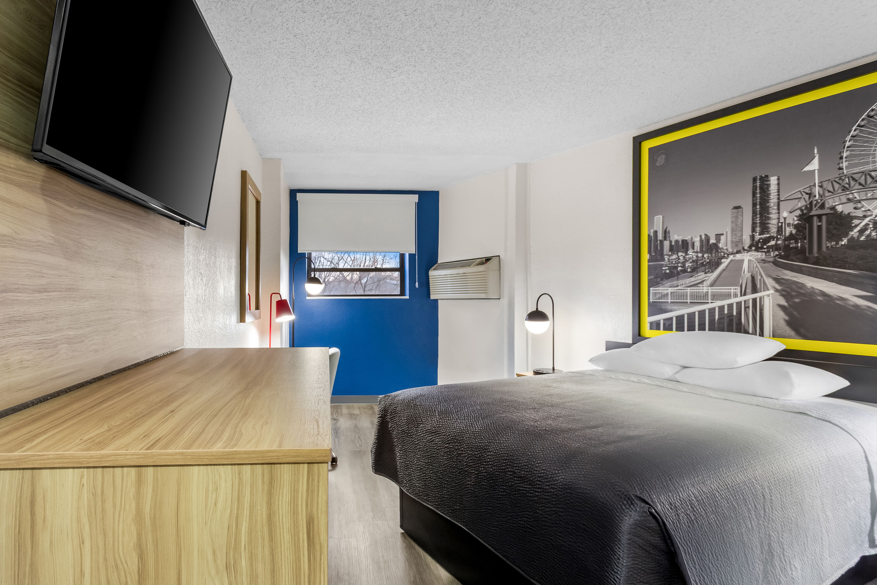 Queen bed guest room at the Super 8 by Wyndham Chicago IL in Chicago, Illinois