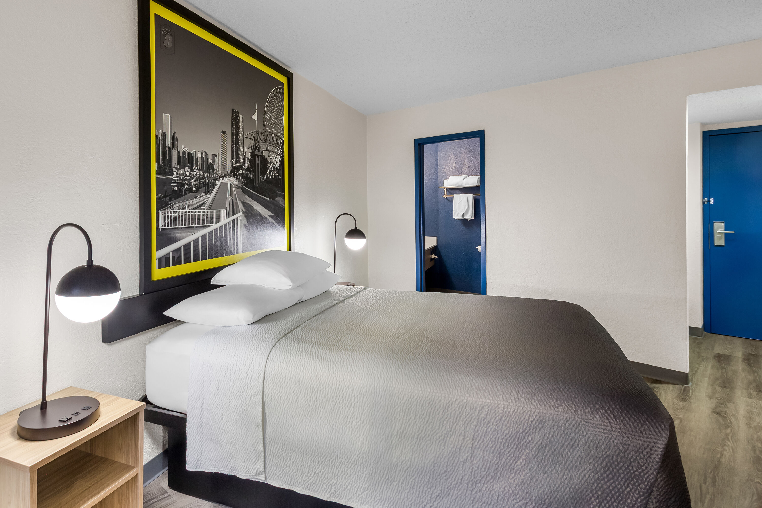 Queen bed guest room at the Super 8 by Wyndham Chicago IL in Chicago, Illinois