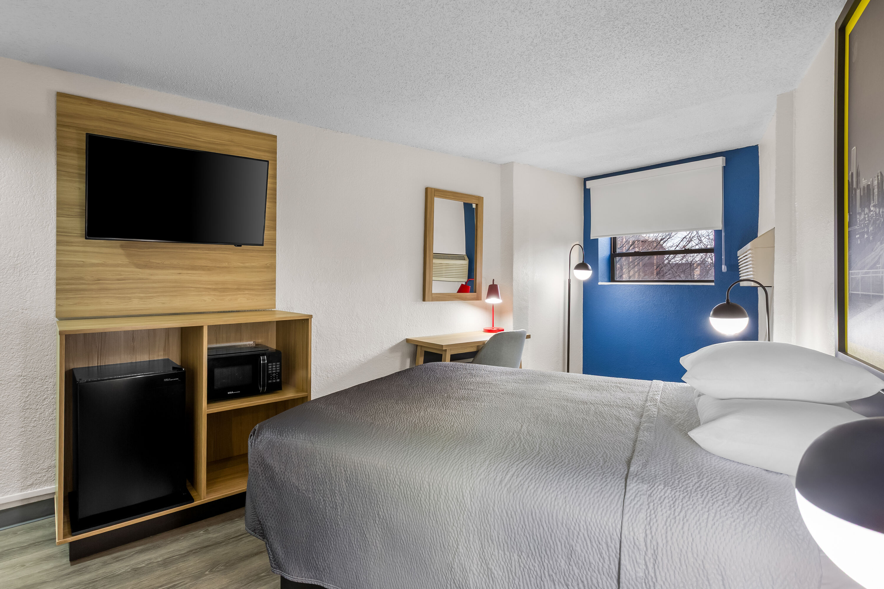 Queen bed guest room at the Super 8 by Wyndham Chicago IL in Chicago, Illinois