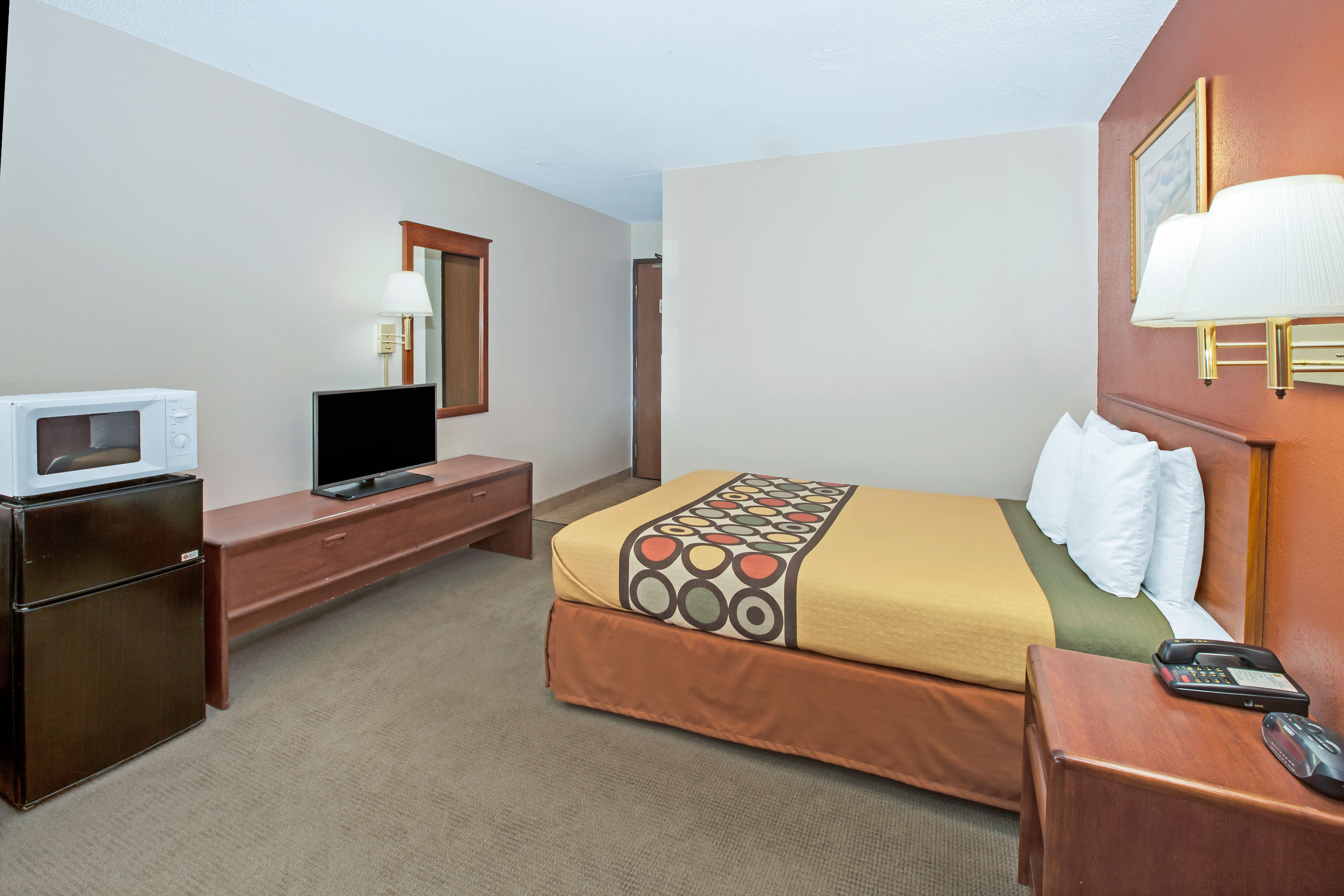 Guest room at the Super 8 by Wyndham Crystal Lake in Crystal Lake, Illinois