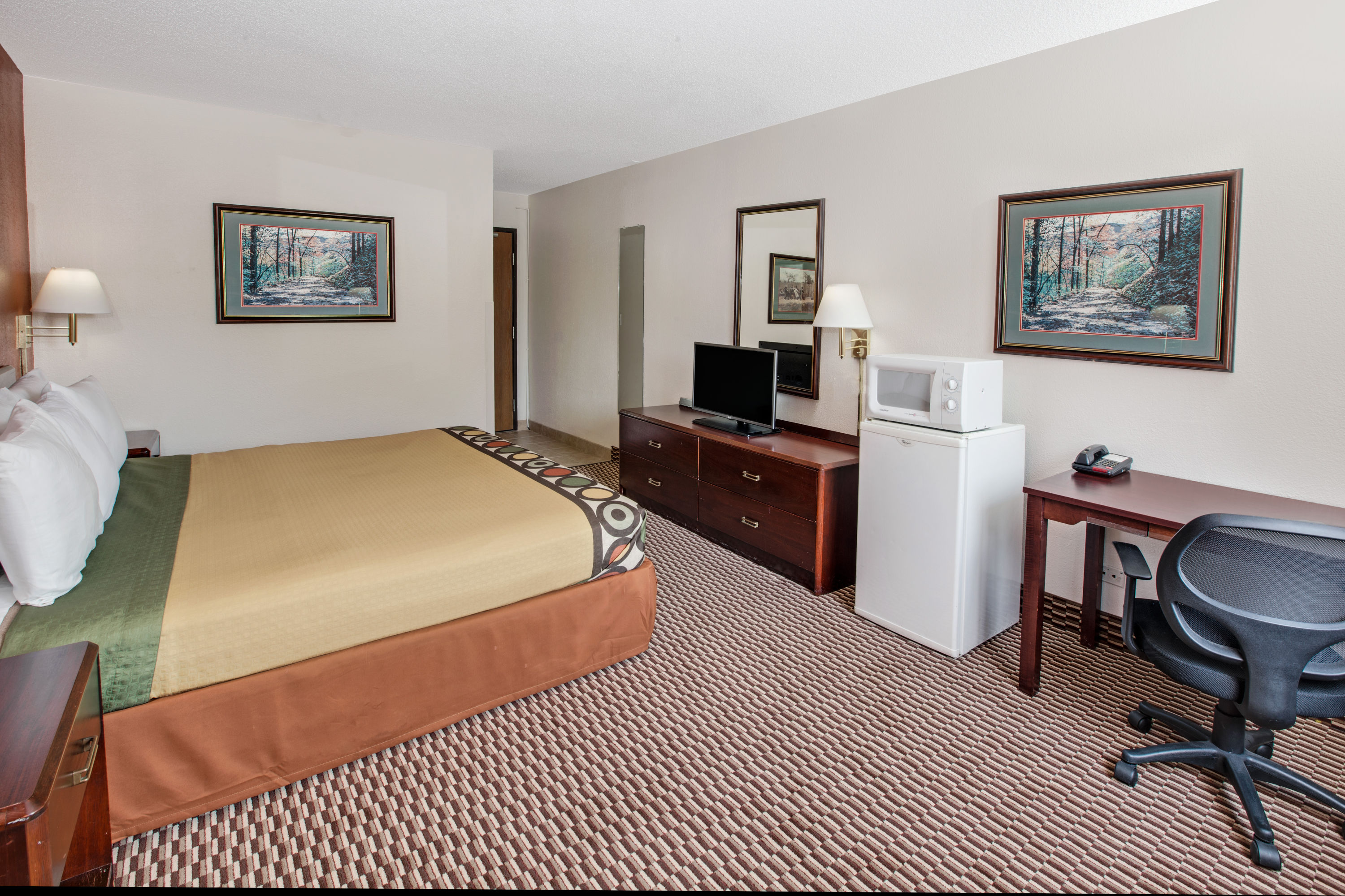 Guest room at the Super 8 by Wyndham Crystal Lake in Crystal Lake, Illinois