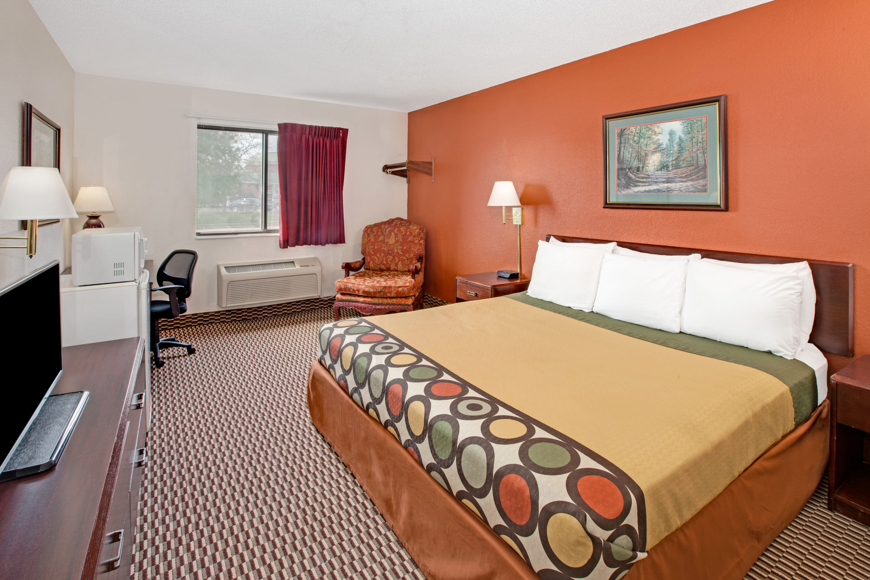 Guest room at the Super 8 by Wyndham Crystal Lake in Crystal Lake, Illinois