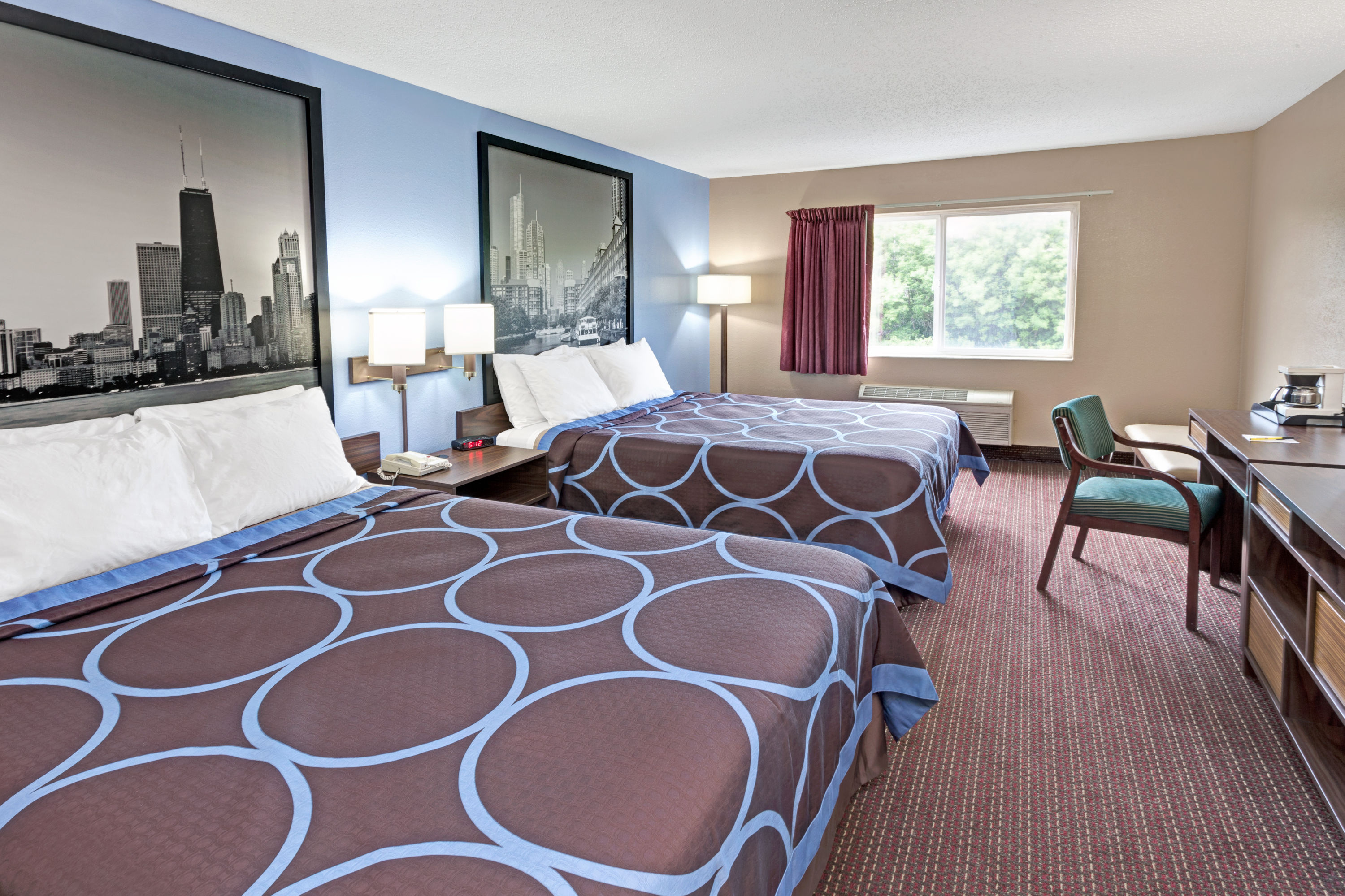 Guest room at the Super 8 by Wyndham Chicago O'Hare Airport in Elk Grove Village, Illinois