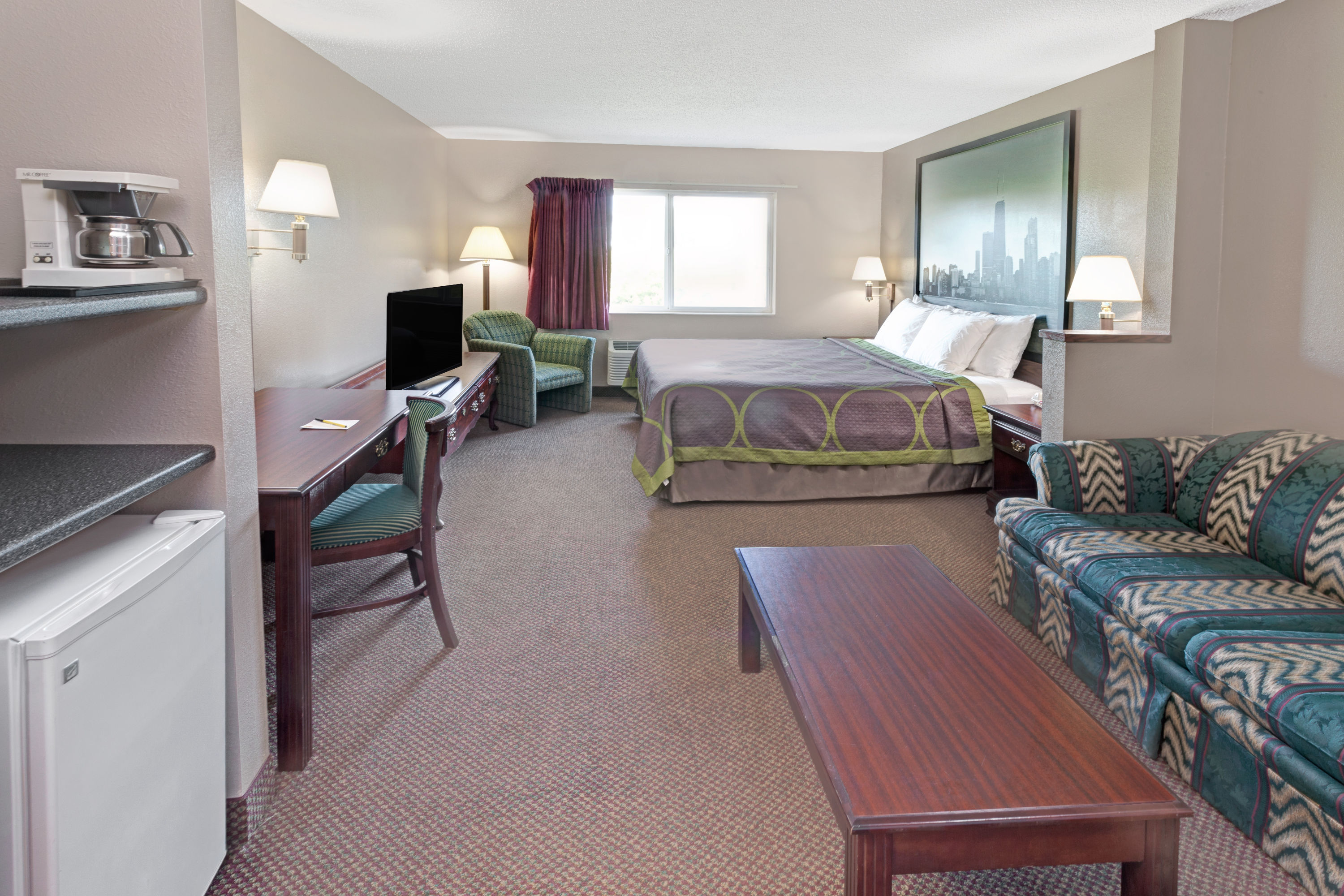 Guest room at the Super 8 by Wyndham Chicago O'Hare Airport in Elk Grove Village, Illinois
