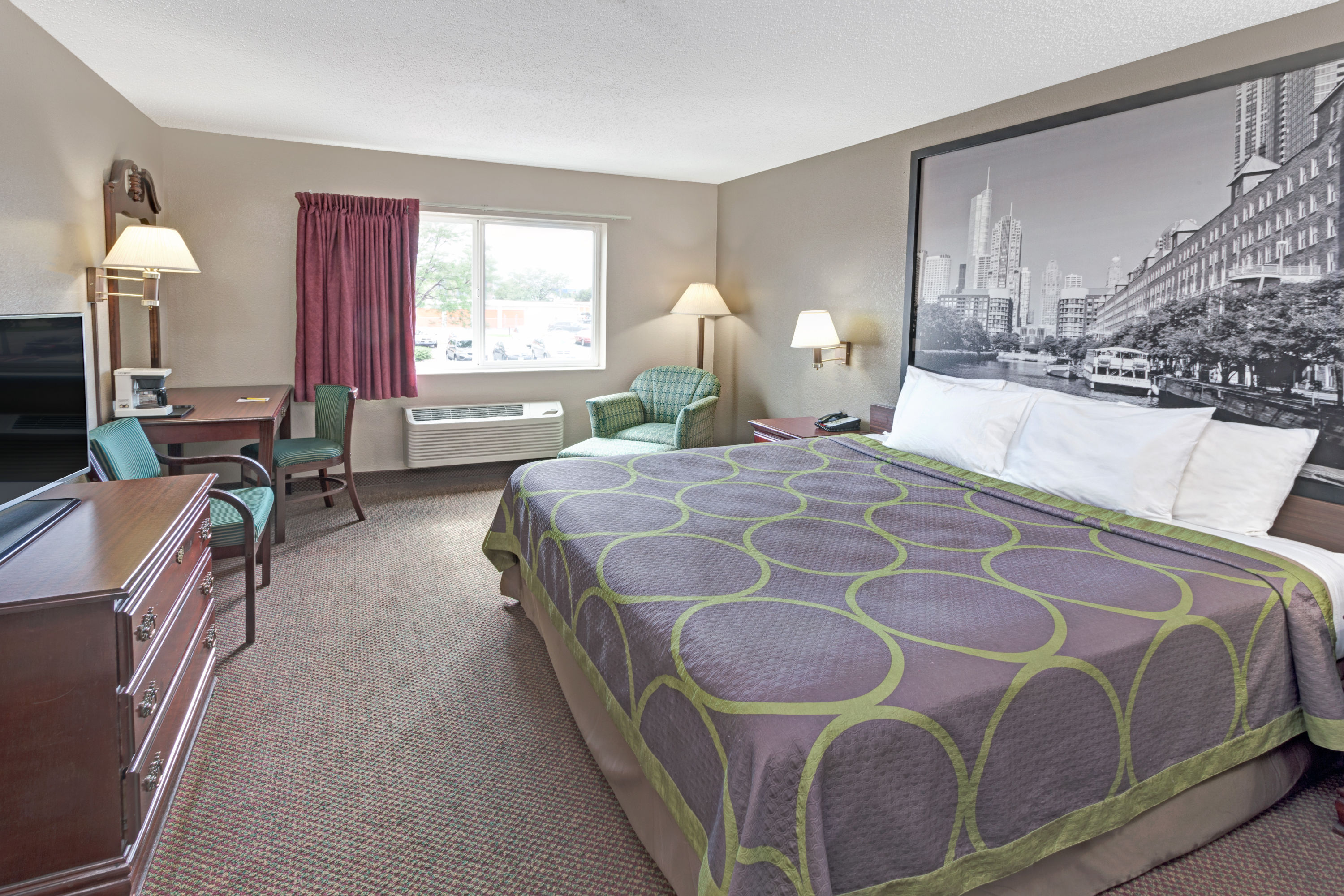 Guest room at the Super 8 by Wyndham Chicago O'Hare Airport in Elk Grove Village, Illinois