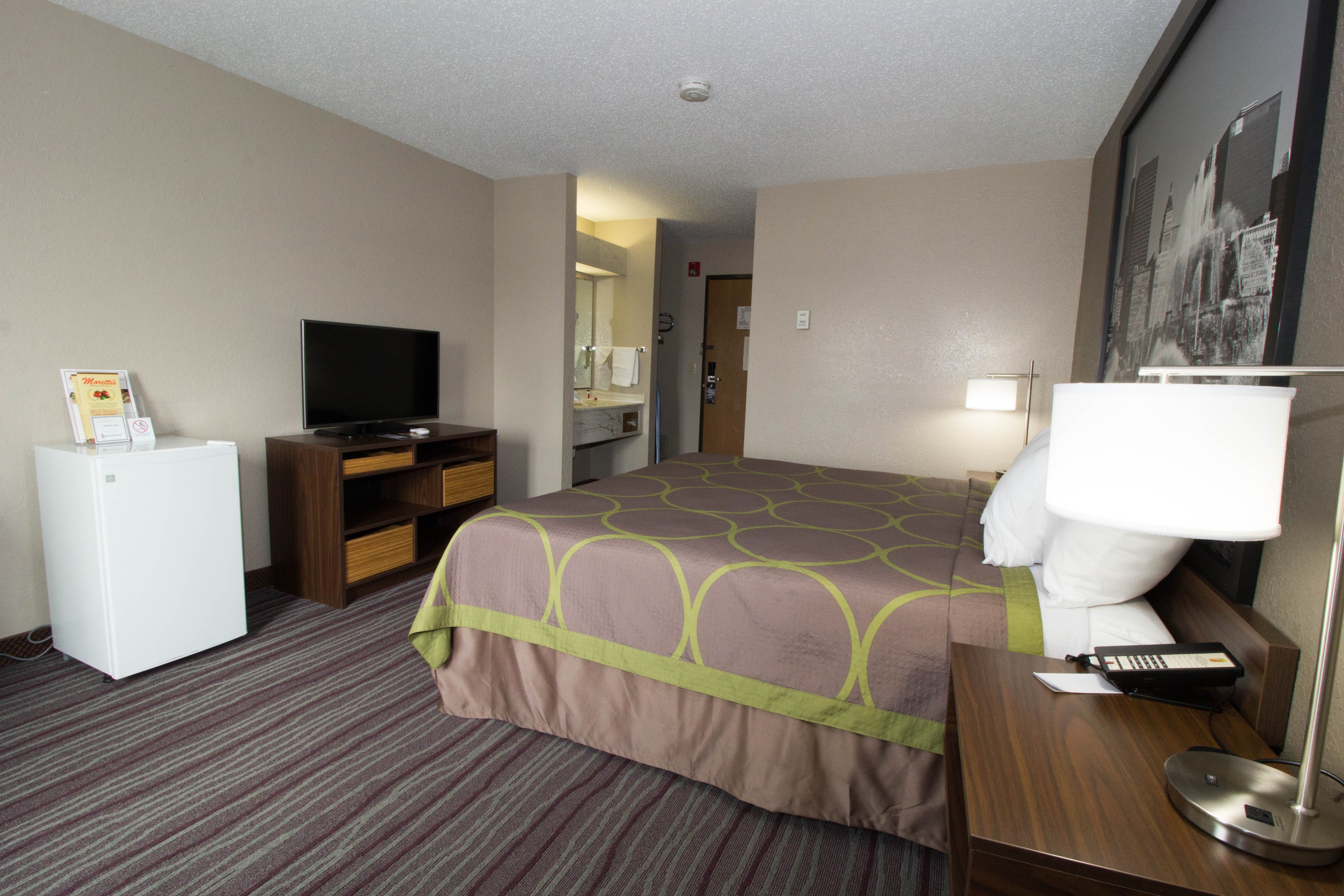 Guest room at the Super 8 by Wyndham Chicago O'Hare Airport in Elk Grove Village, Illinois