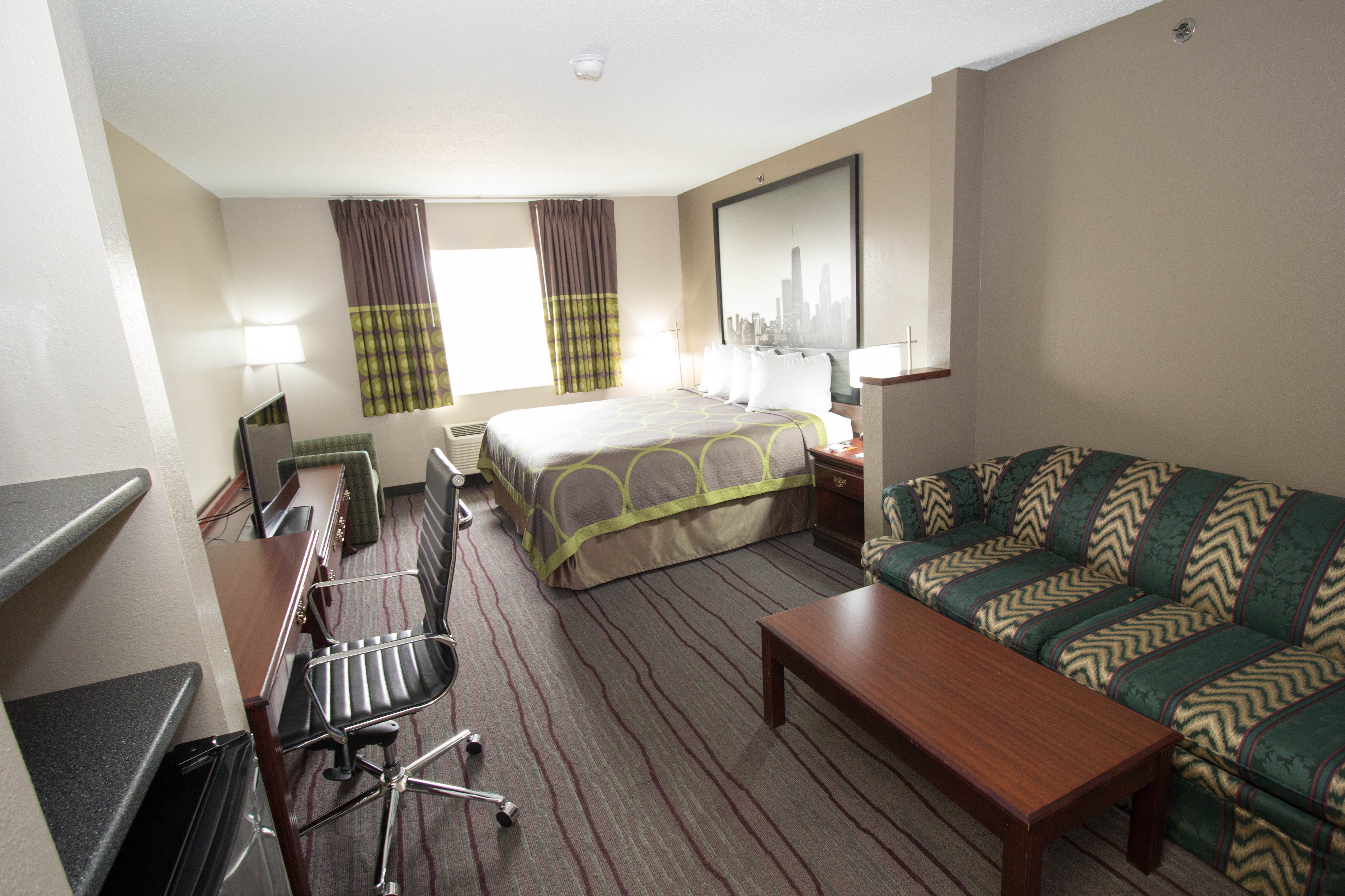 Guest room at the Super 8 by Wyndham Chicago O'Hare Airport in Elk Grove Village, Illinois