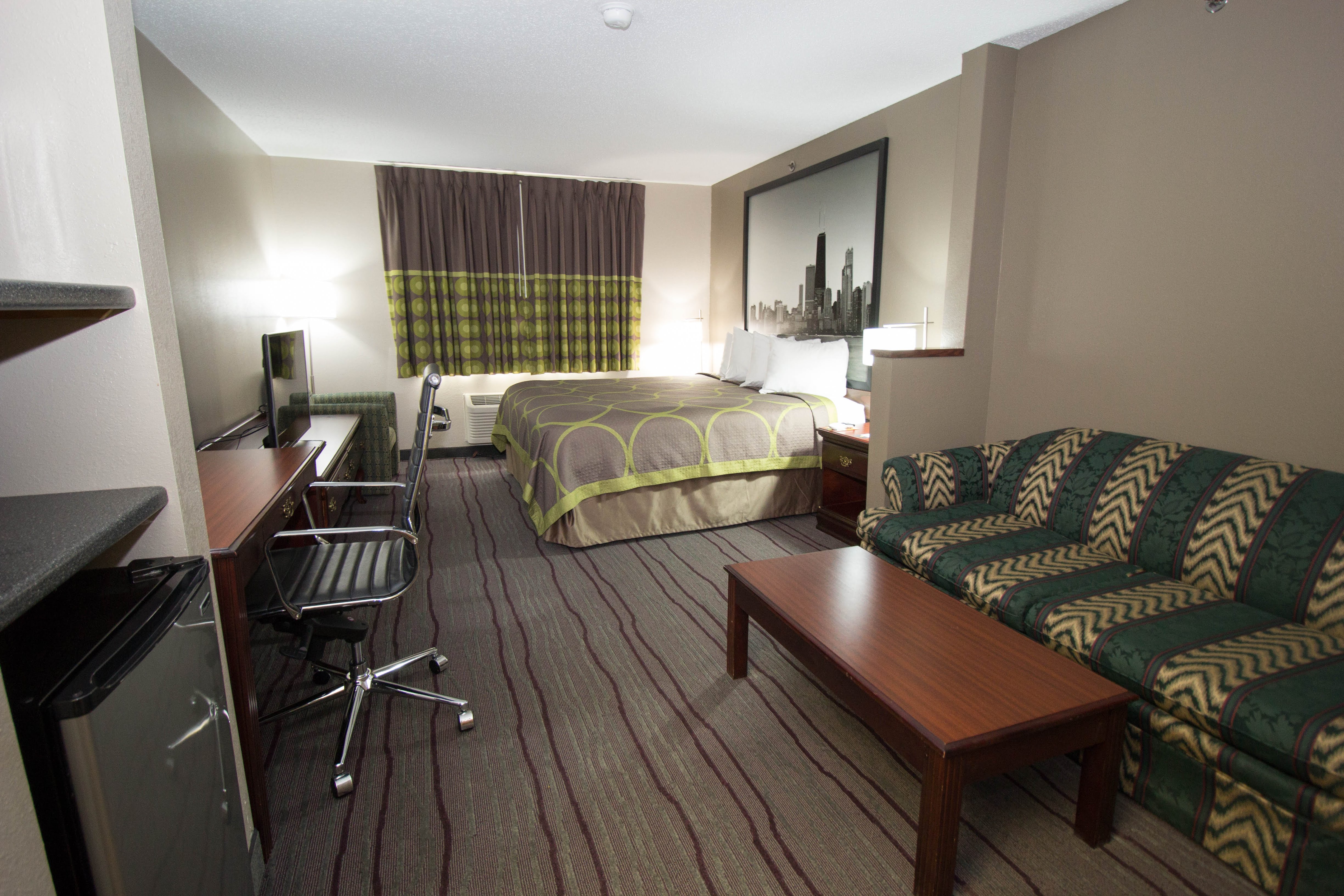 Guest room at the Super 8 by Wyndham Chicago O'Hare Airport in Elk Grove Village, Illinois