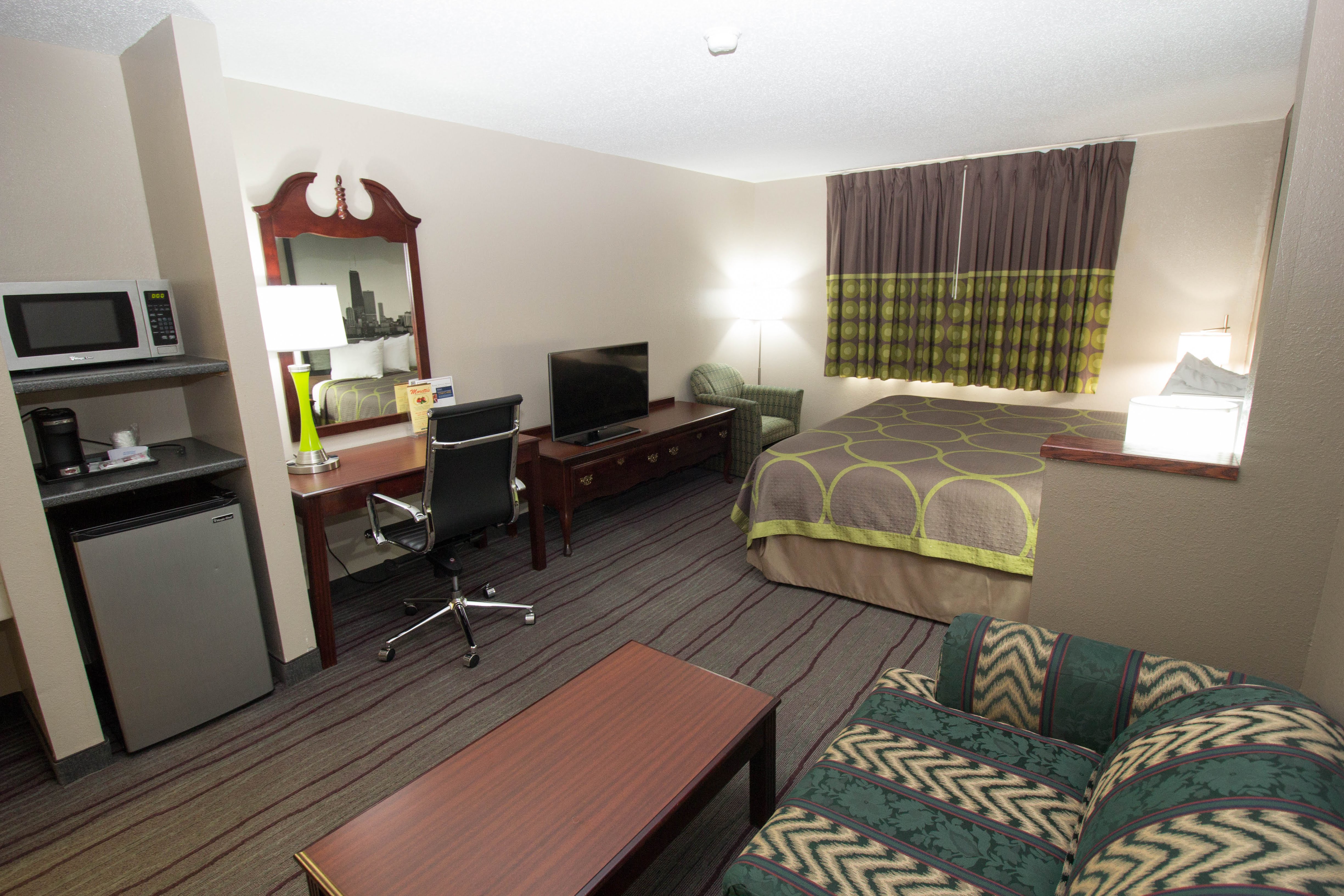 Guest room at the Super 8 by Wyndham Chicago O'Hare Airport in Elk Grove Village, Illinois