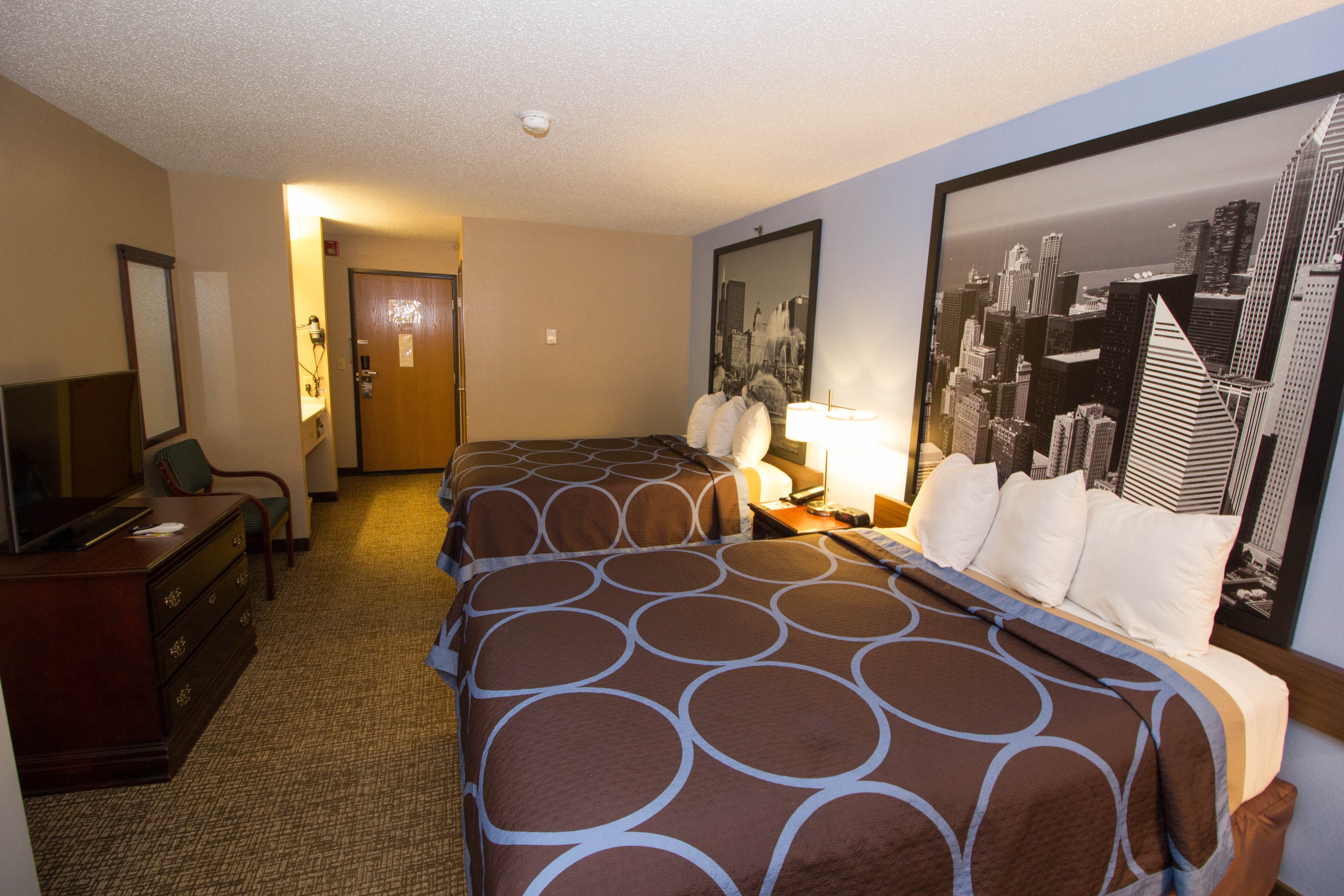 Guest room at the Super 8 by Wyndham Chicago O'Hare Airport in Elk Grove Village, Illinois