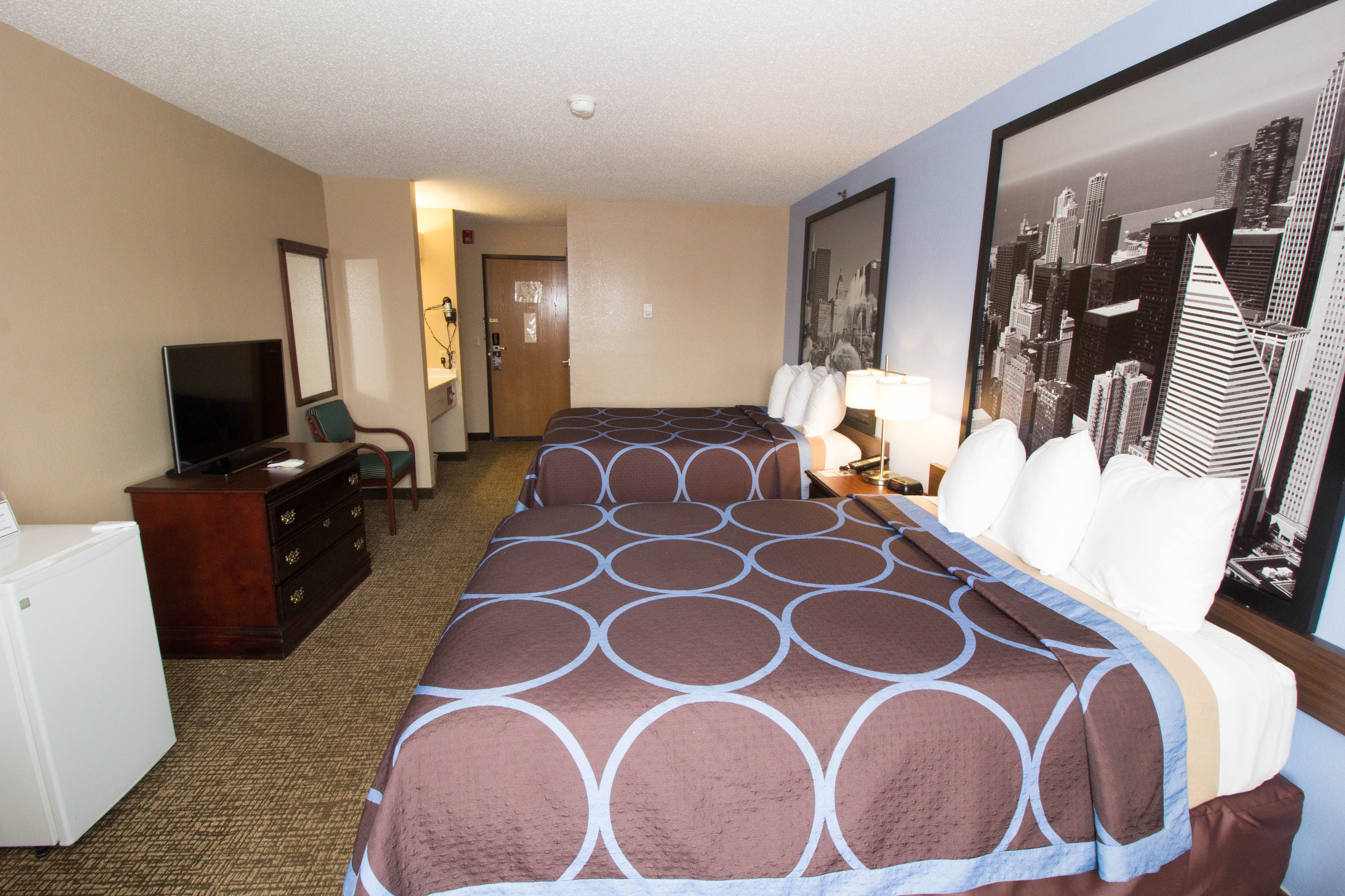 Guest room at the Super 8 by Wyndham Chicago O'Hare Airport in Elk Grove Village, Illinois