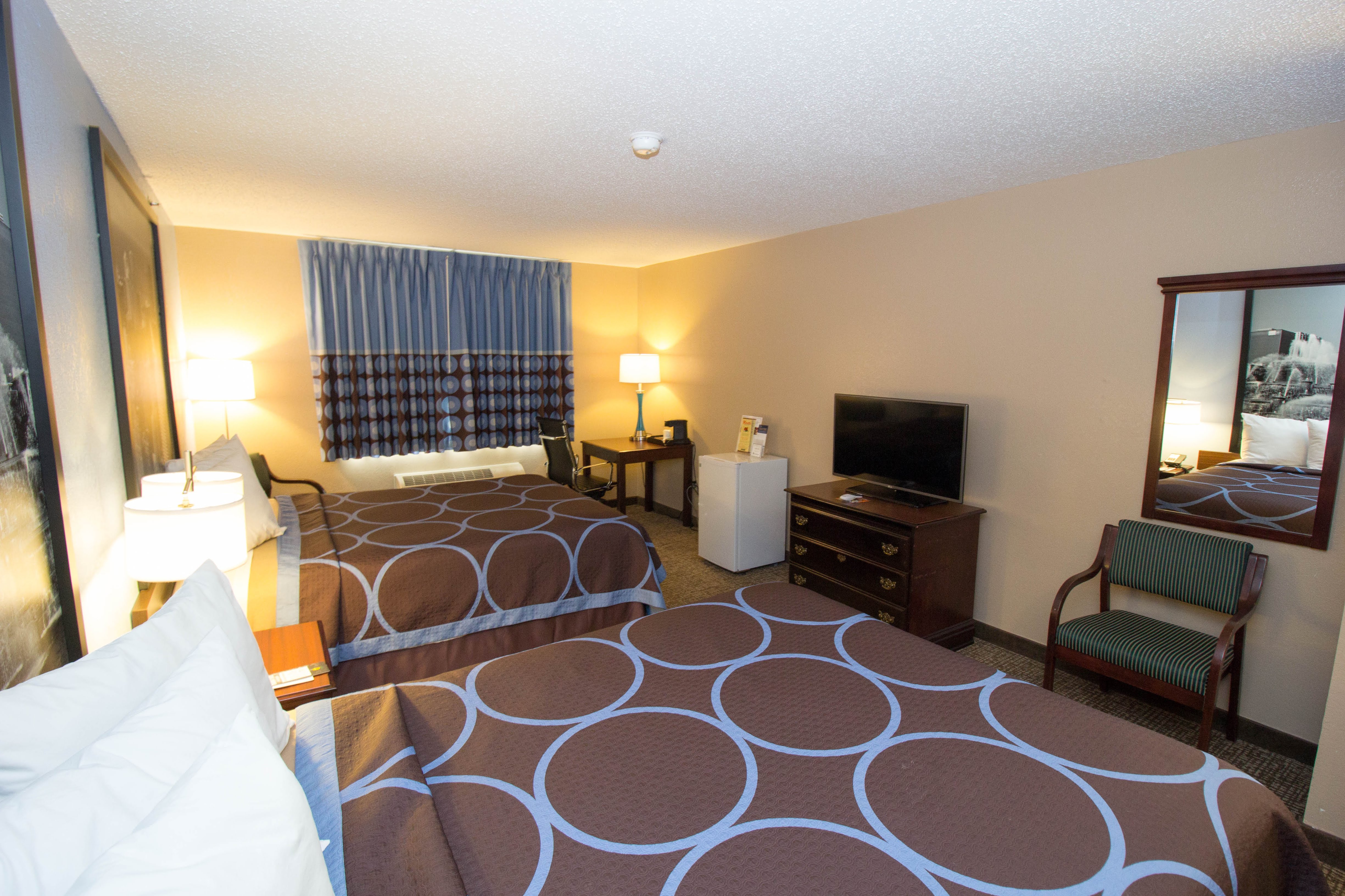 Guest room at the Super 8 by Wyndham Chicago O'Hare Airport in Elk Grove Village, Illinois