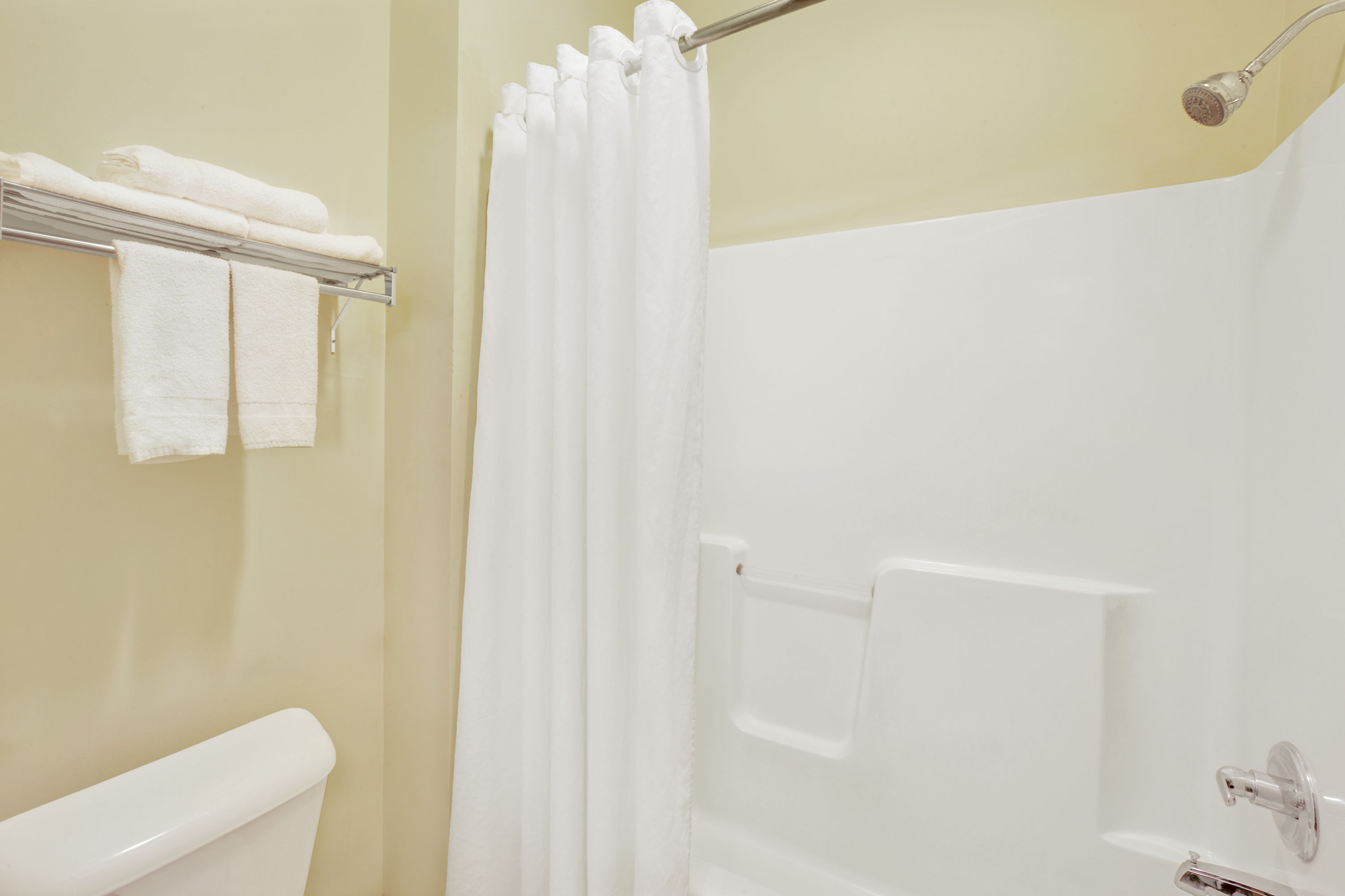 Guest room at the Super 8 by Wyndham Hampshire IL in Hampshire, Illinois