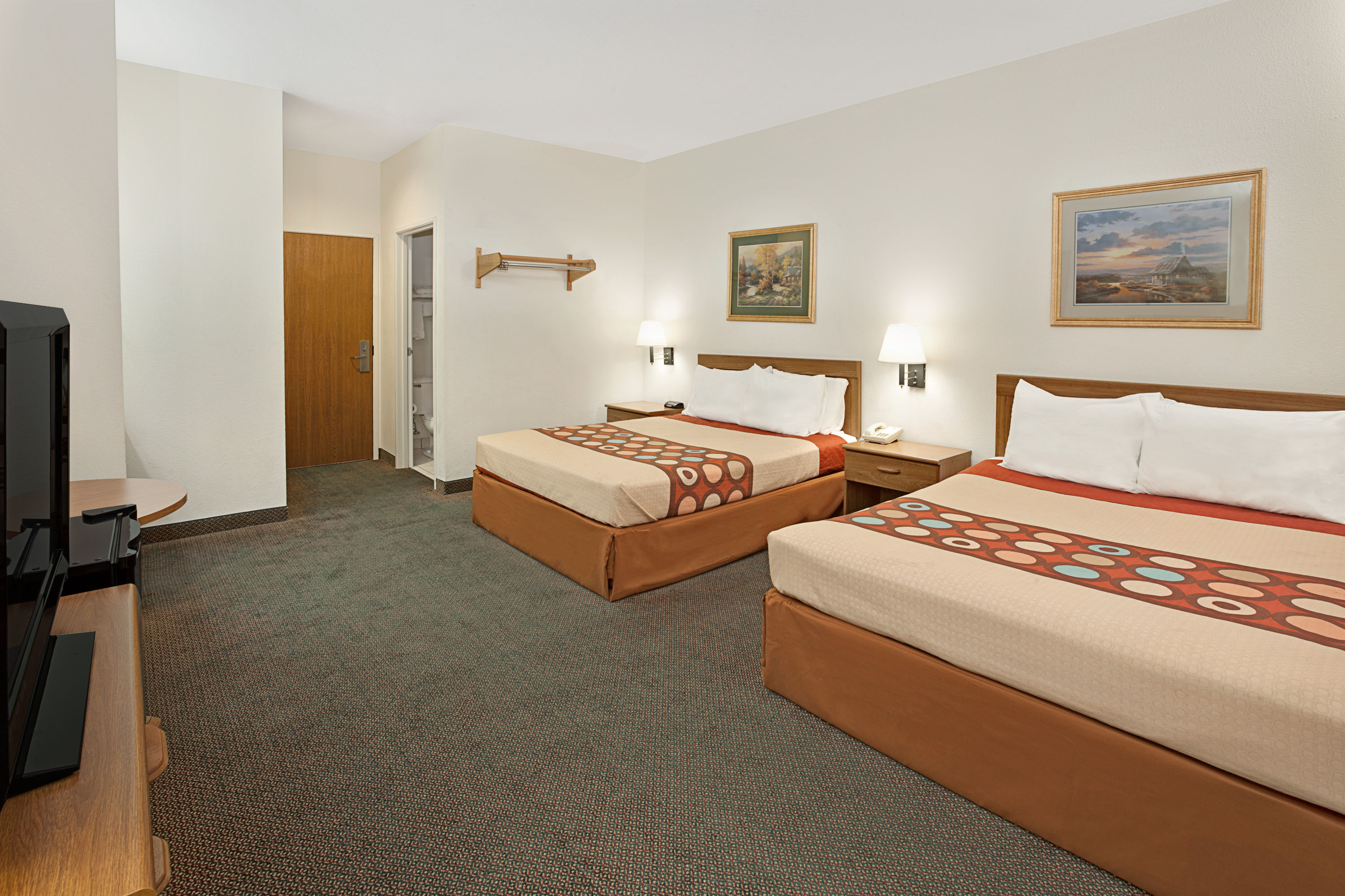 Guest room at the Super 8 by Wyndham Hampshire IL in Hampshire, Illinois
