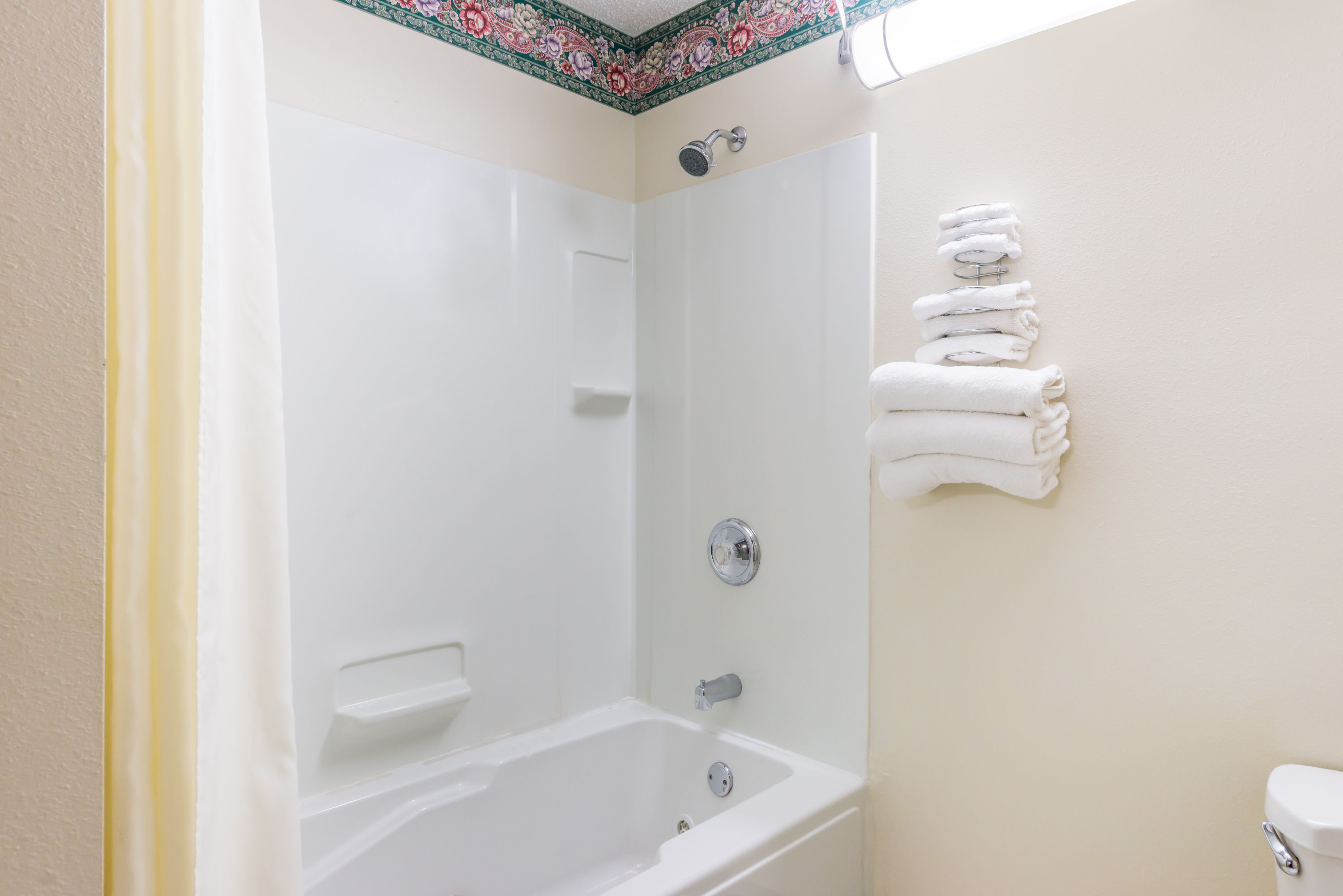 Guest room at the Super 8 by Wyndham Jerseyville in Jerseyville, Illinois