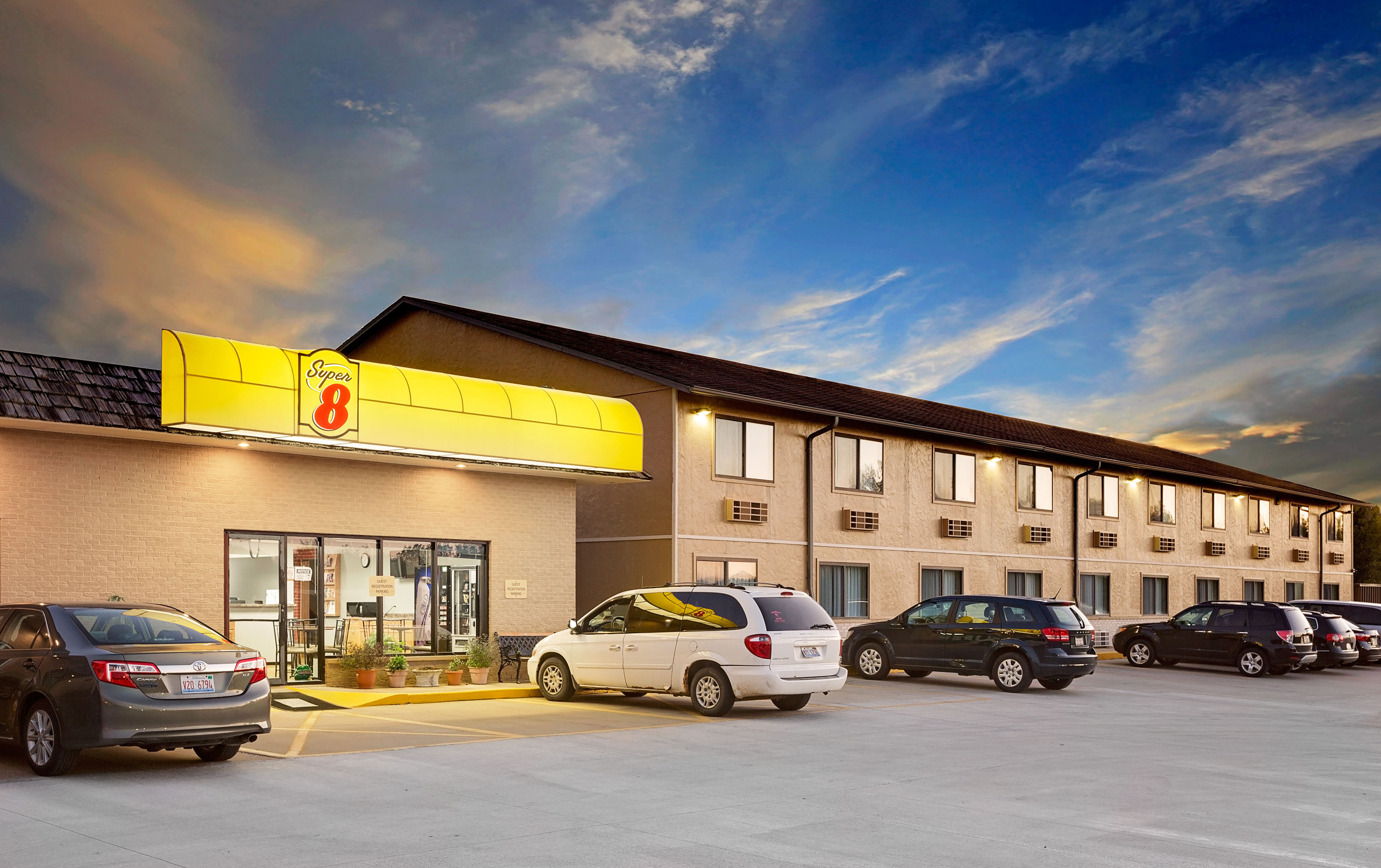 Exterior Dusk Image of Super 8 by Wyndham Macomb hotel in Macomb, Illinois
