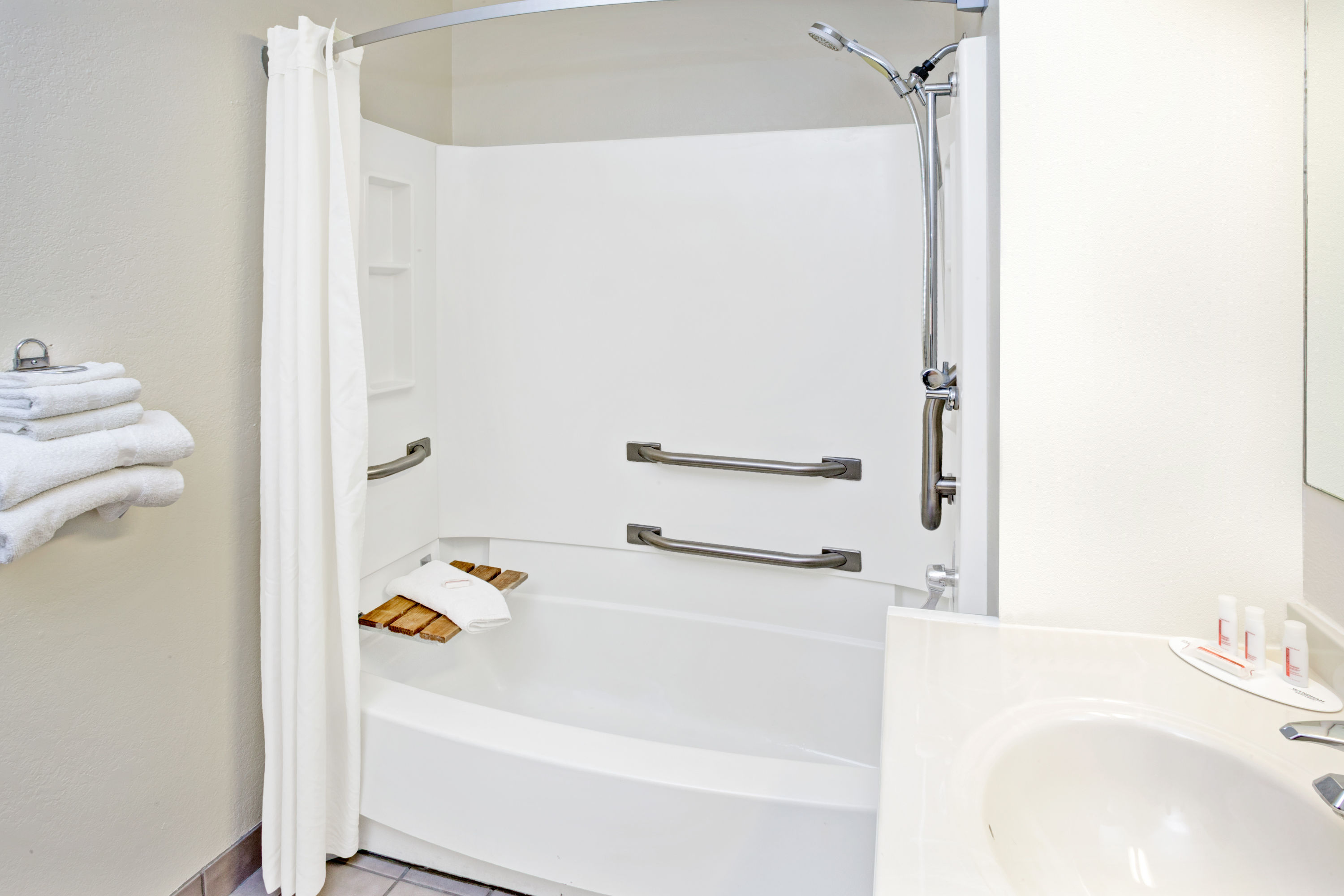 Guest room bath at the Super 8 by Wyndham Mokena/Frankfort /I-80 in Mokena, Illinois