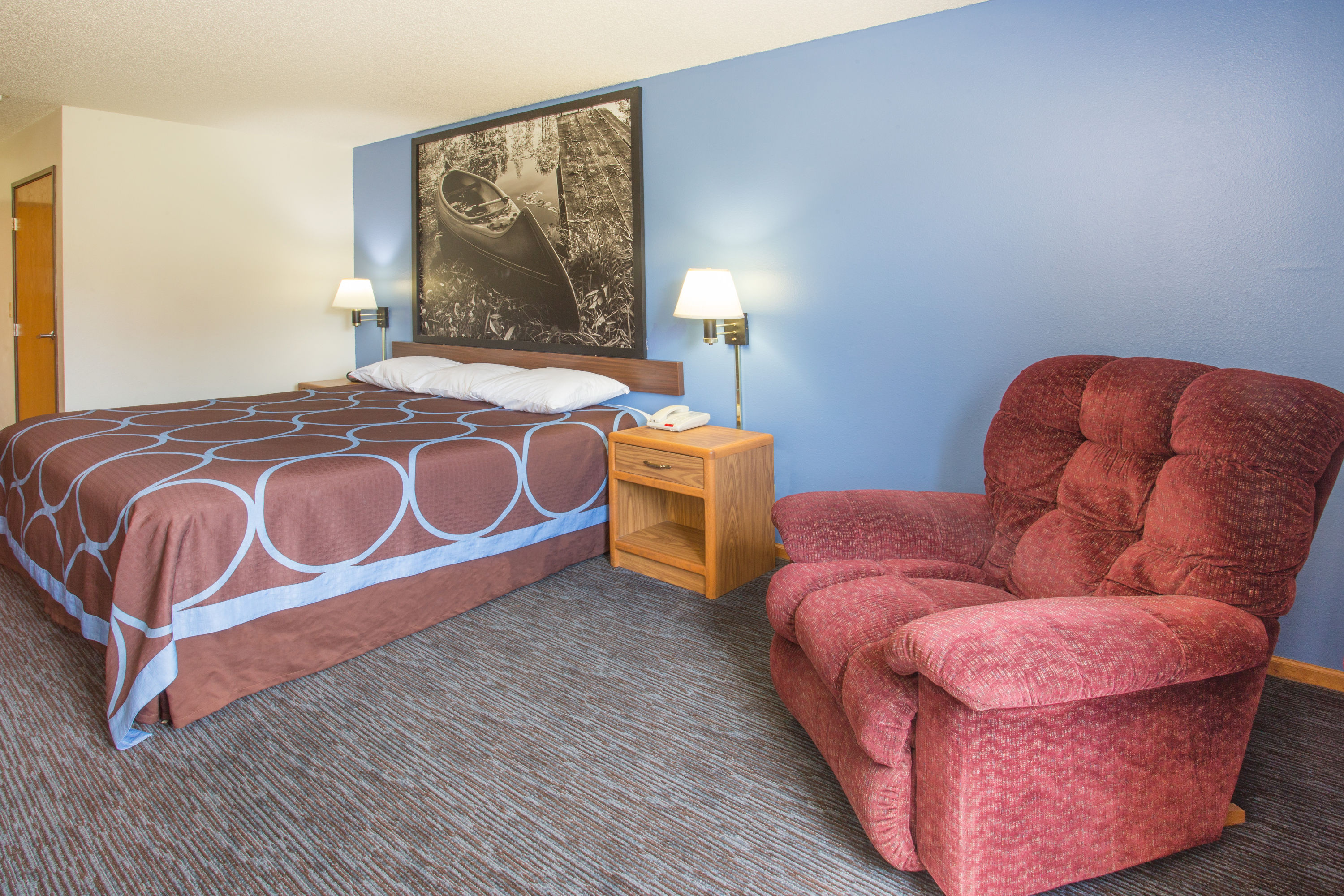 Guest room at the Super 8 by Wyndham Monmouth IL in Monmouth, Illinois