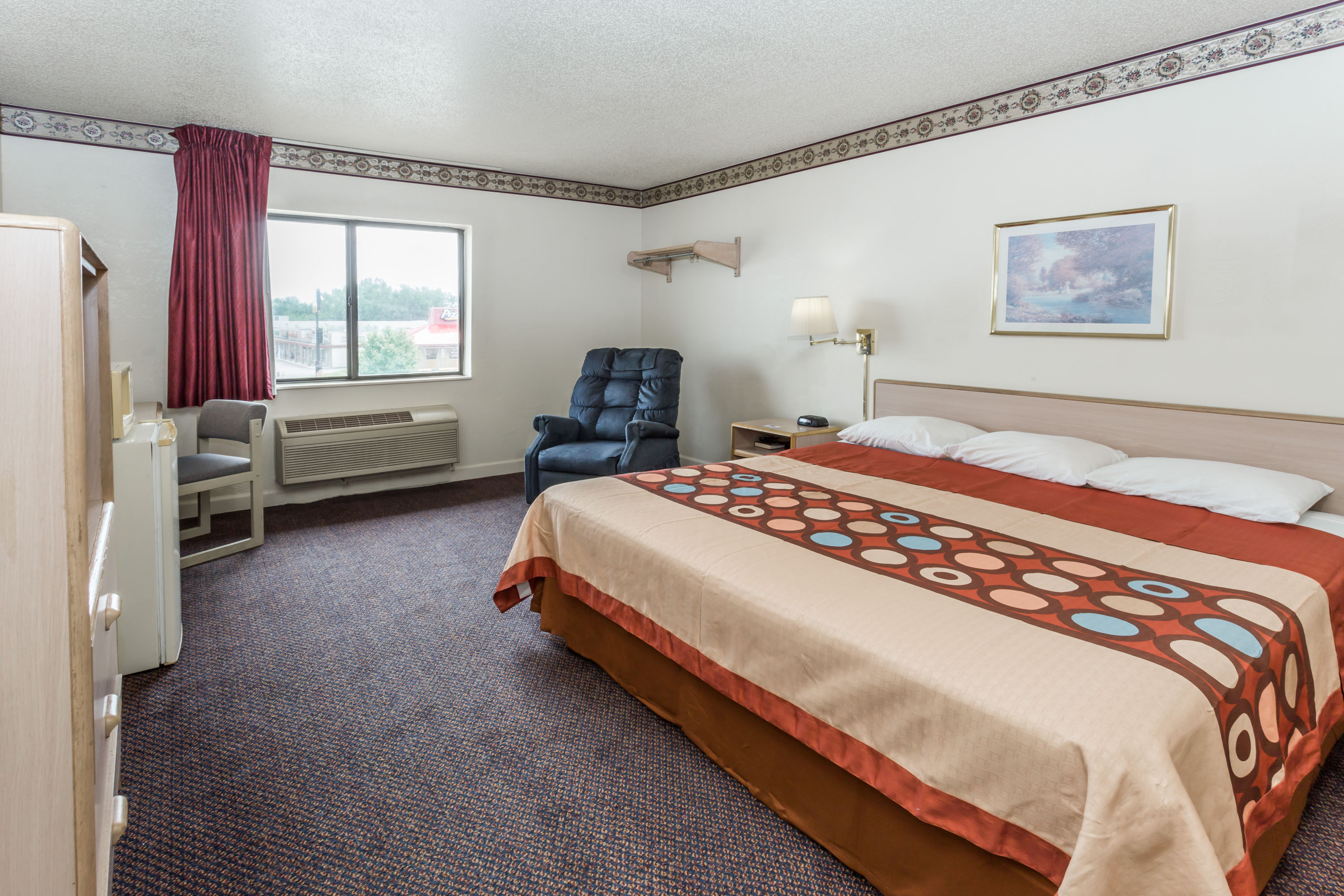 Guest room at the Super 8 by Wyndham Morris in Morris, Illinois