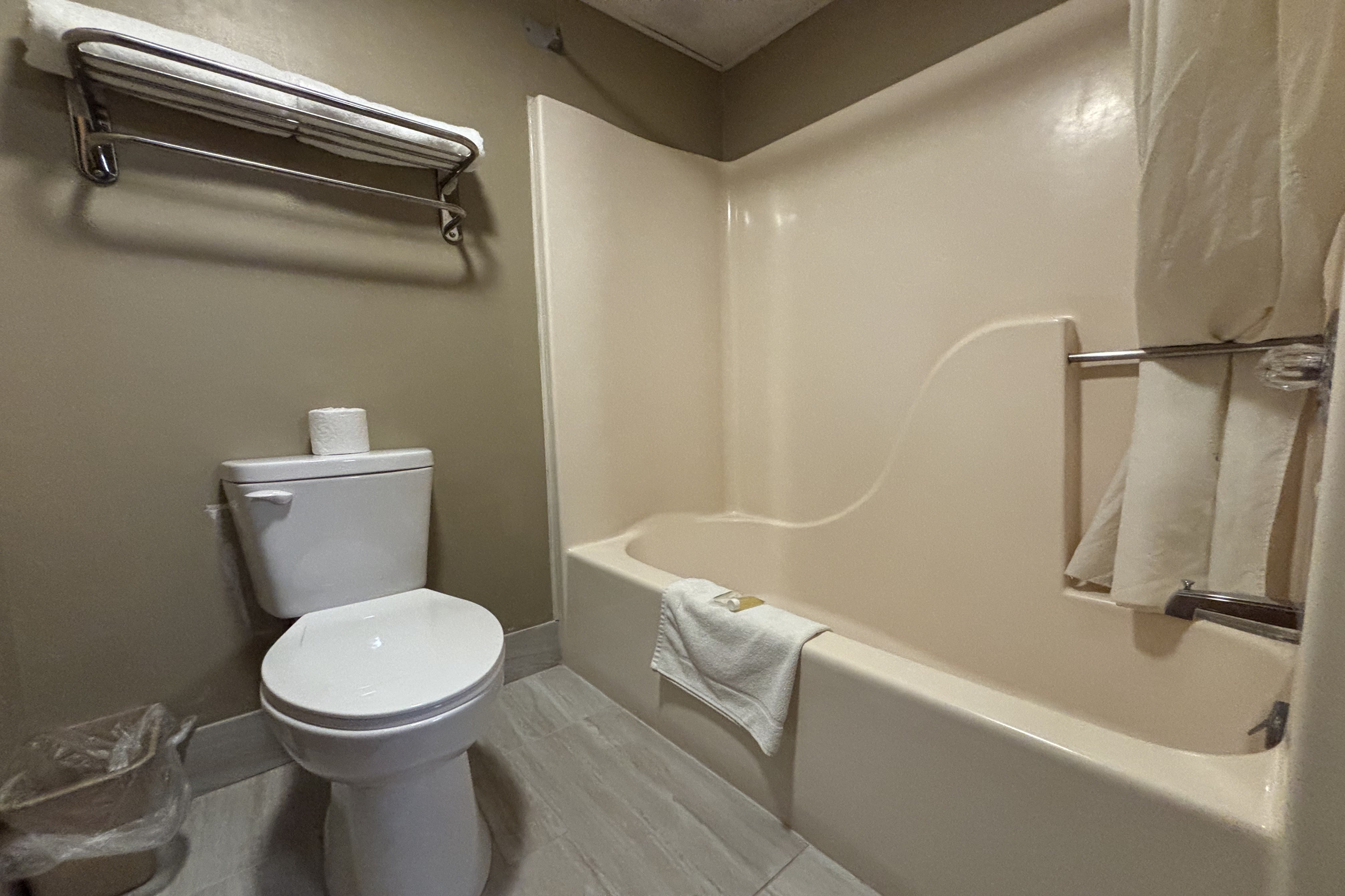 Guest room bath at the Super 8 by Wyndham Normal Bloomington in Normal, Illinois