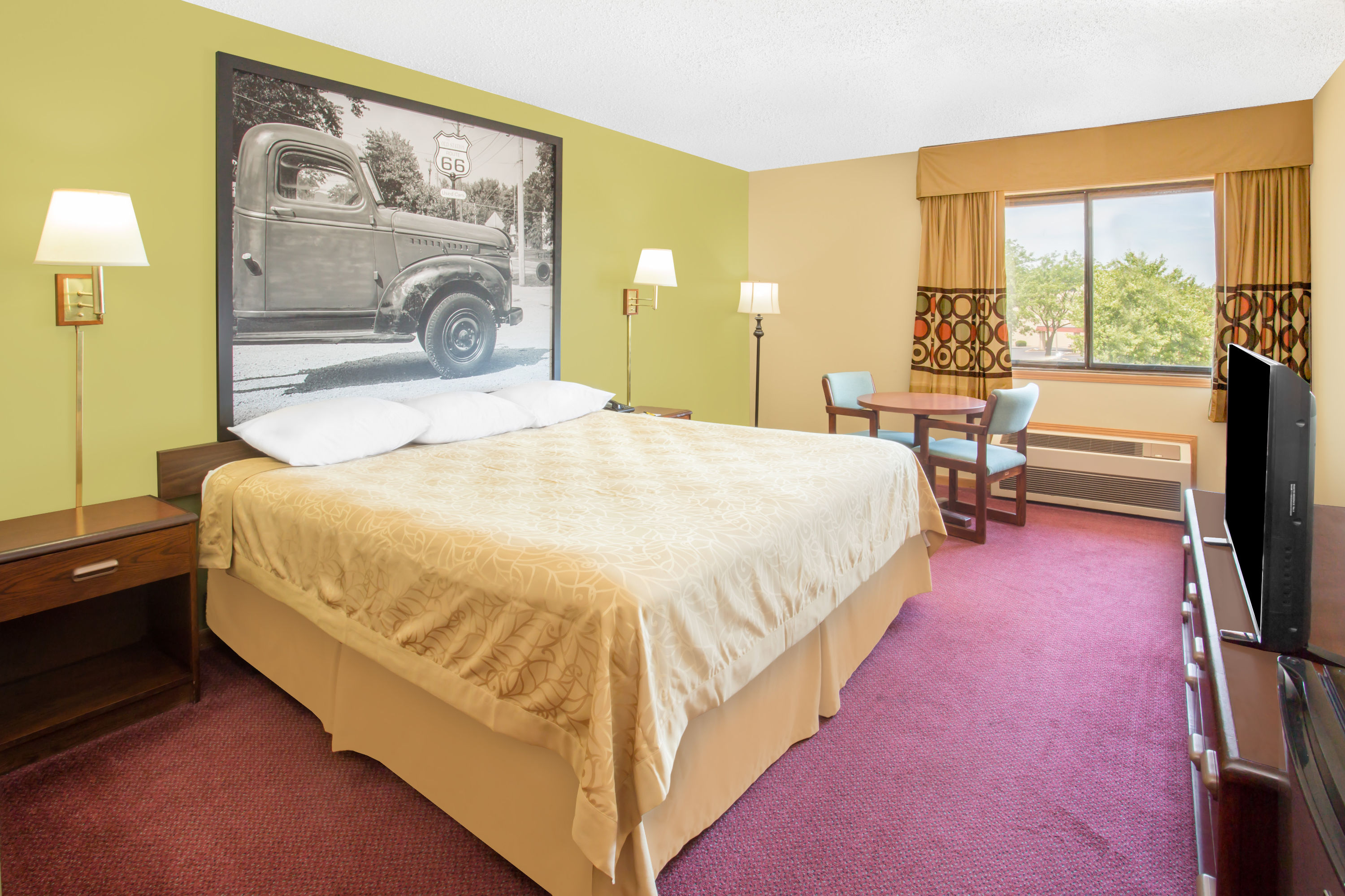 Guest room at the Super 8 by Wyndham Normal Bloomington in Normal, Illinois