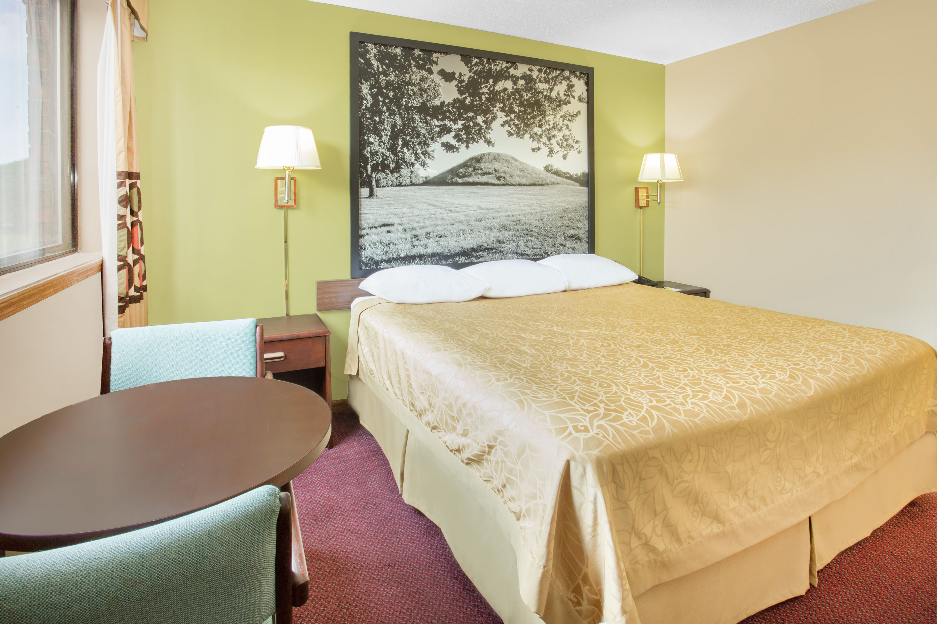 Guest room at the Super 8 by Wyndham Normal Bloomington in Normal, Illinois