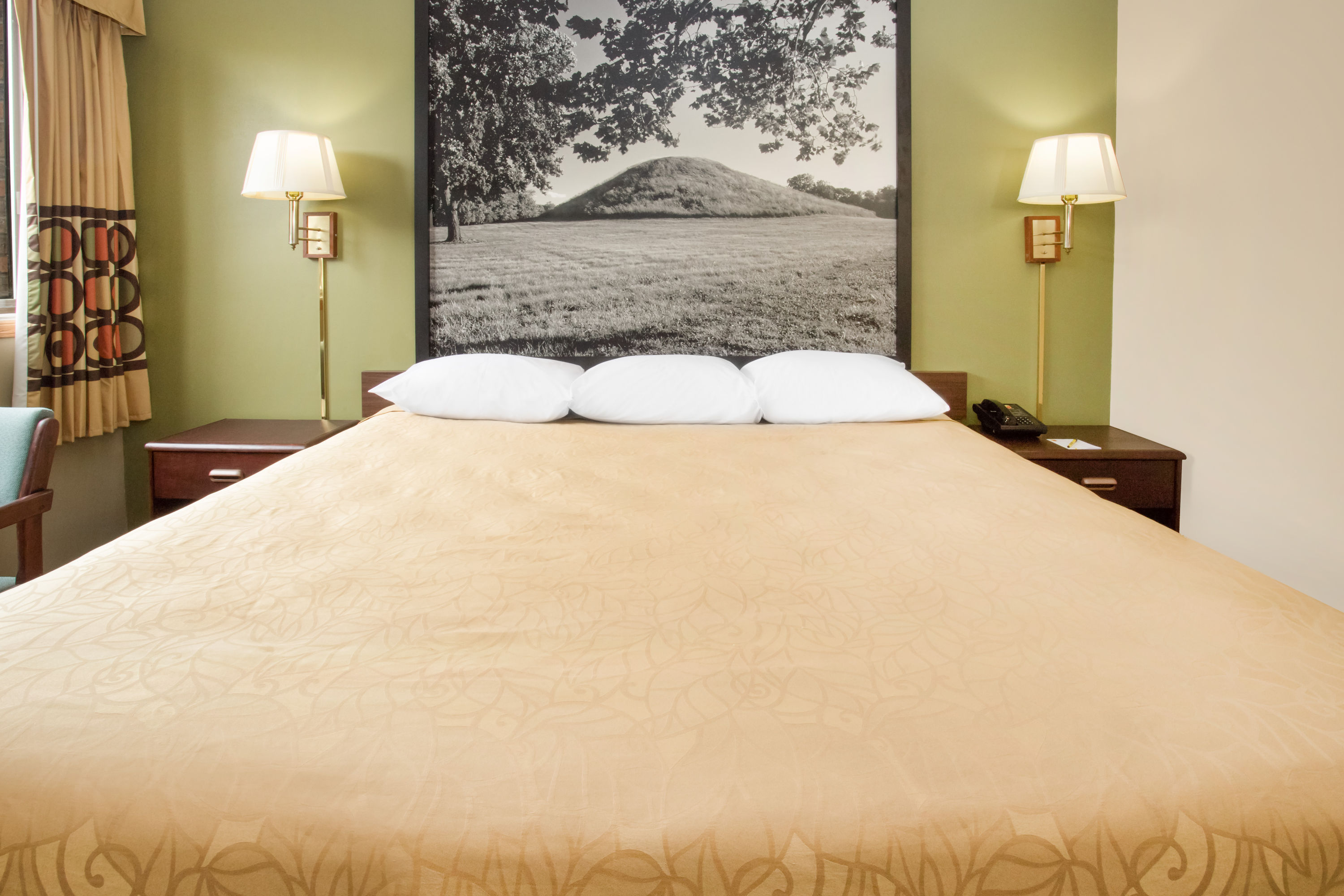 Guest room at the Super 8 by Wyndham Normal Bloomington in Normal, Illinois