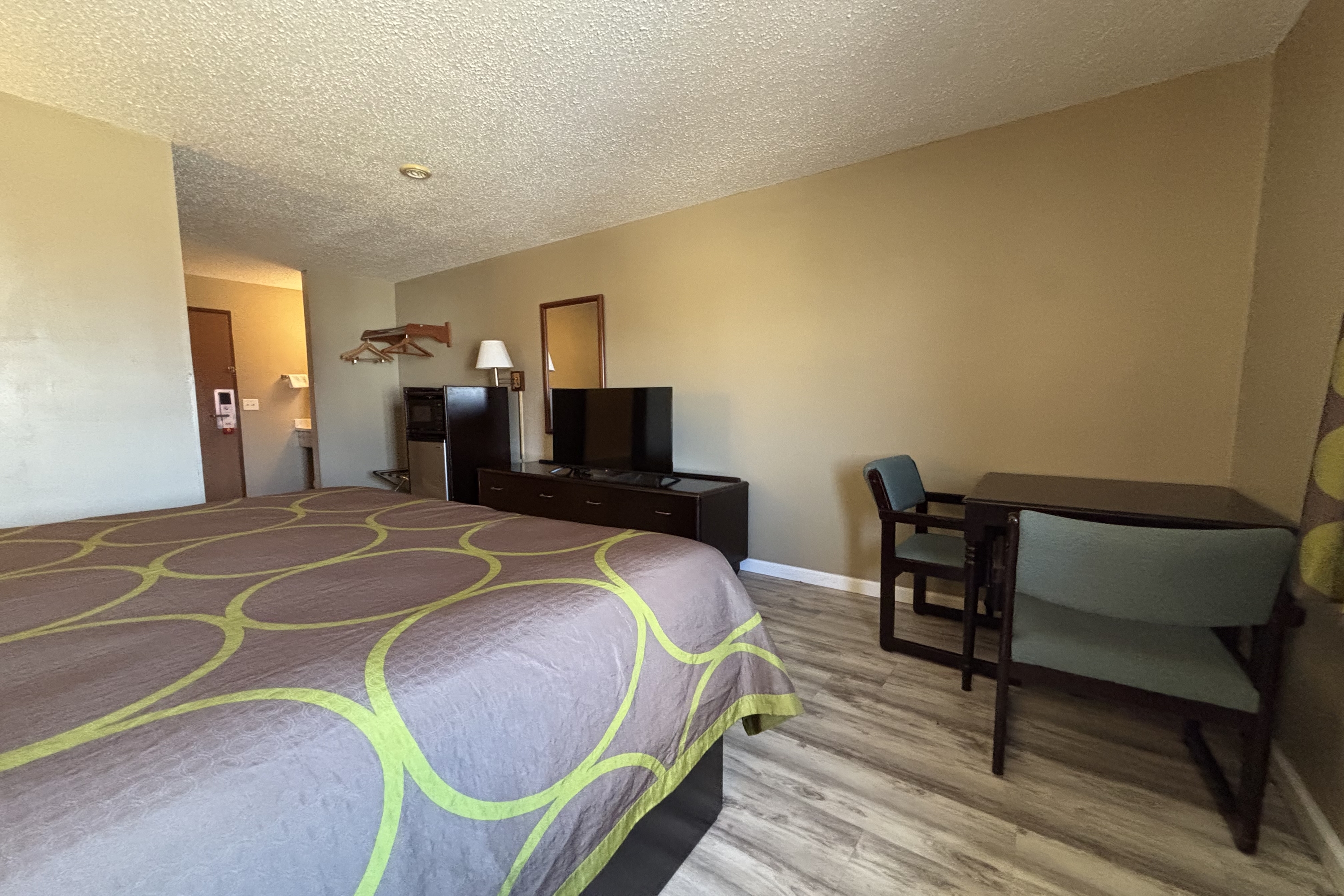 Guest room at the Super 8 by Wyndham Normal Bloomington in Normal, Illinois