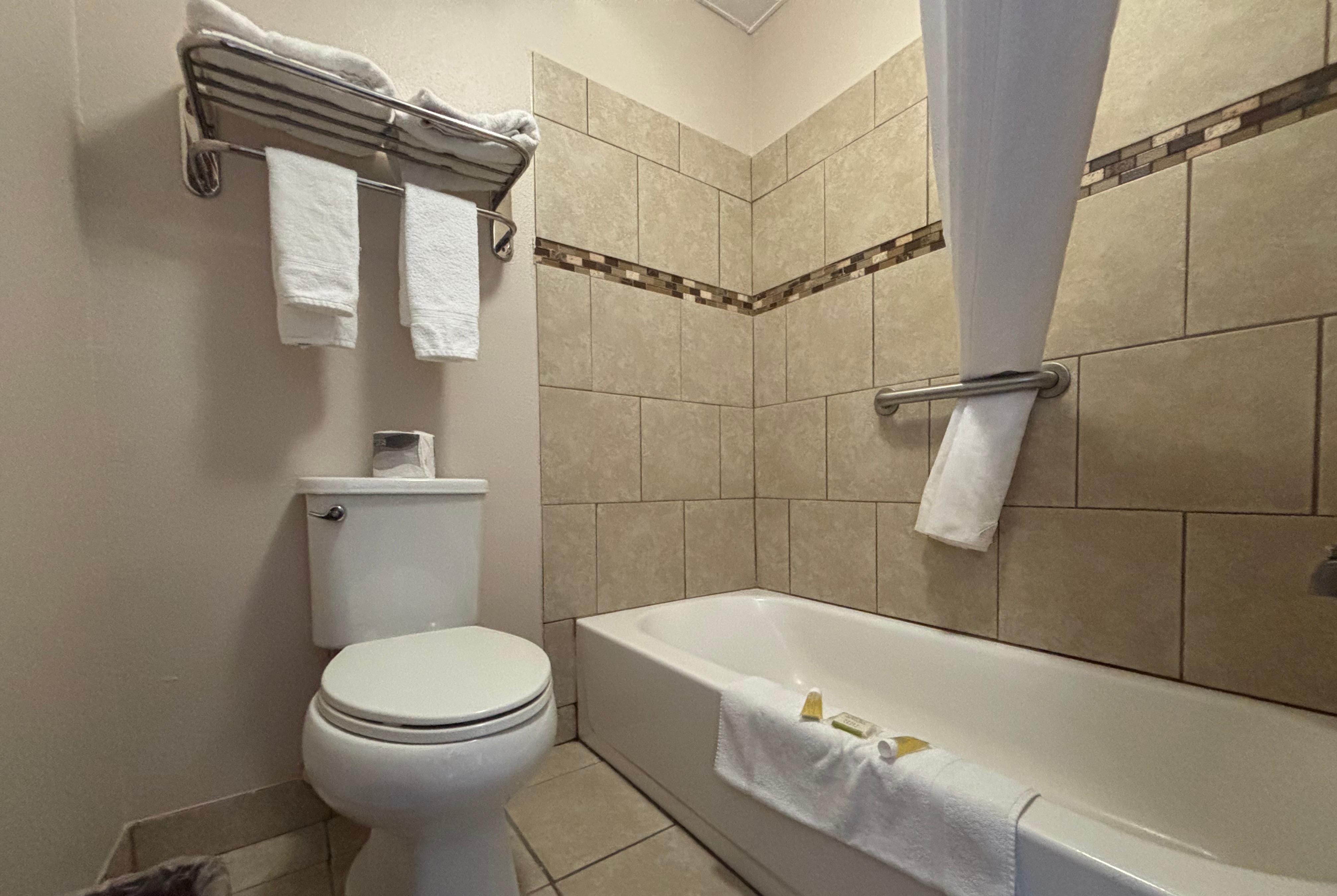 Guest room bath at the Super 8 by Wyndham Okawville in Okawville, Illinois