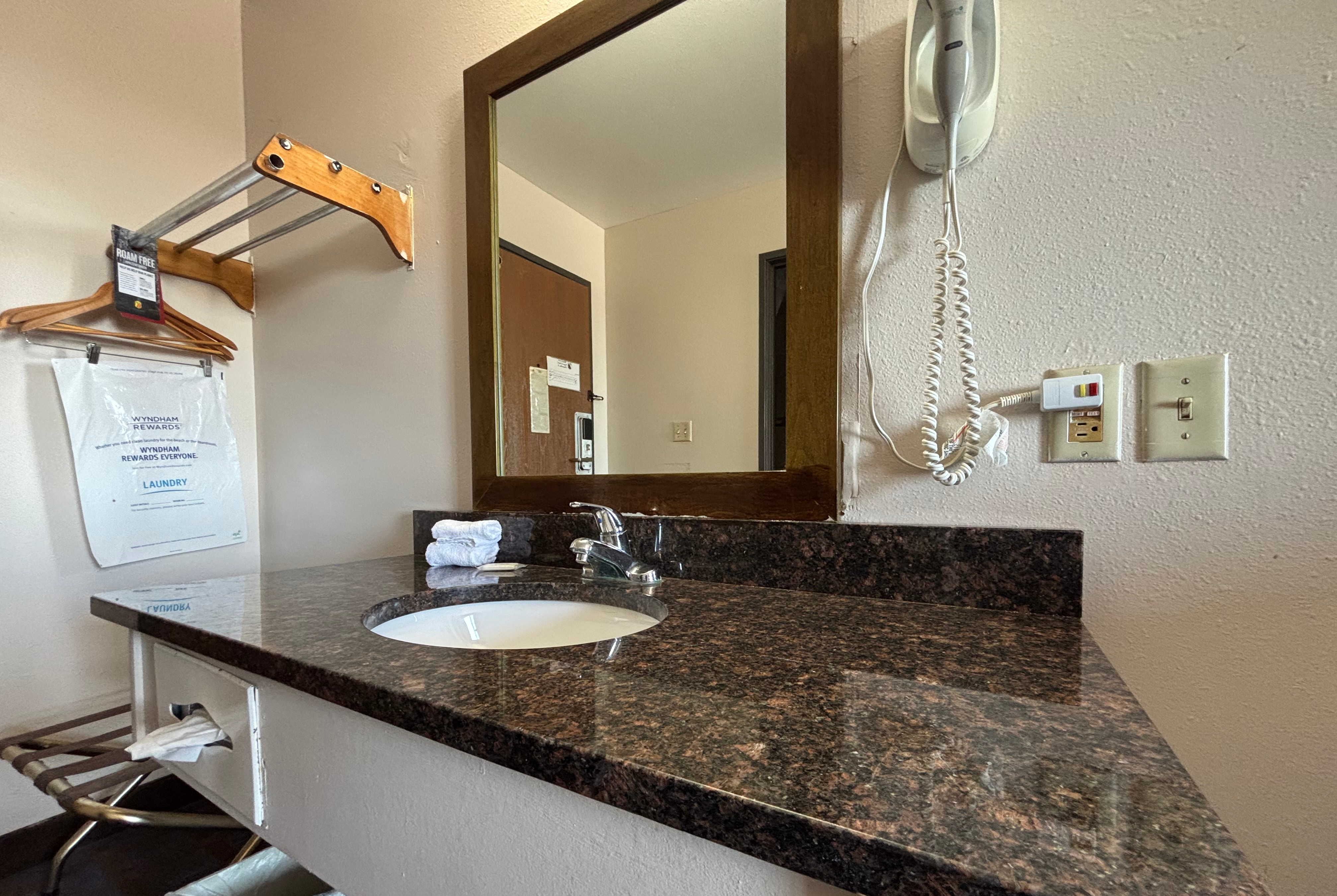 Guest room bath at the Super 8 by Wyndham Okawville in Okawville, Illinois