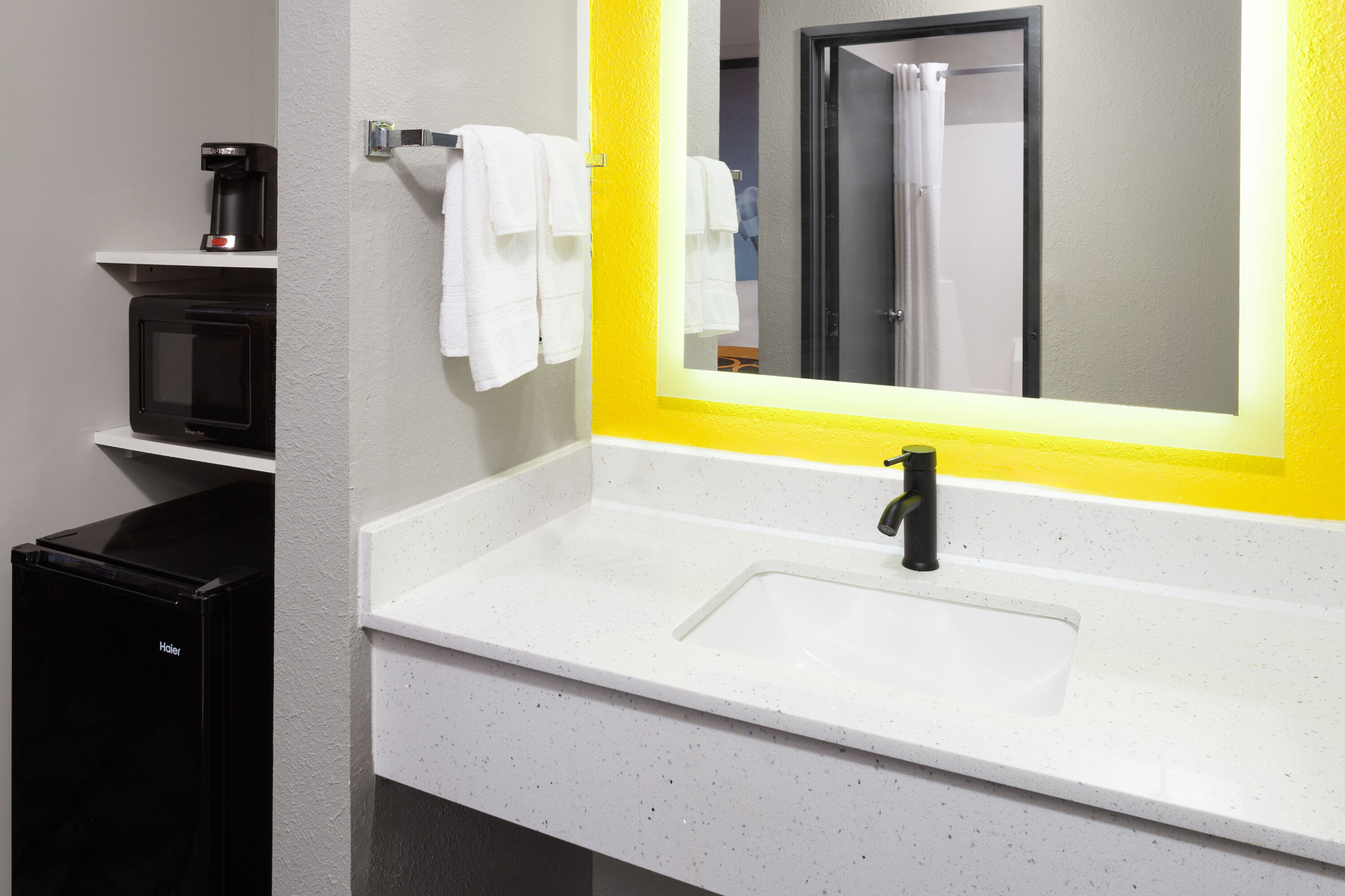 Guest room bath at the Super 8 by Wyndham Olney in Olney, Illinois