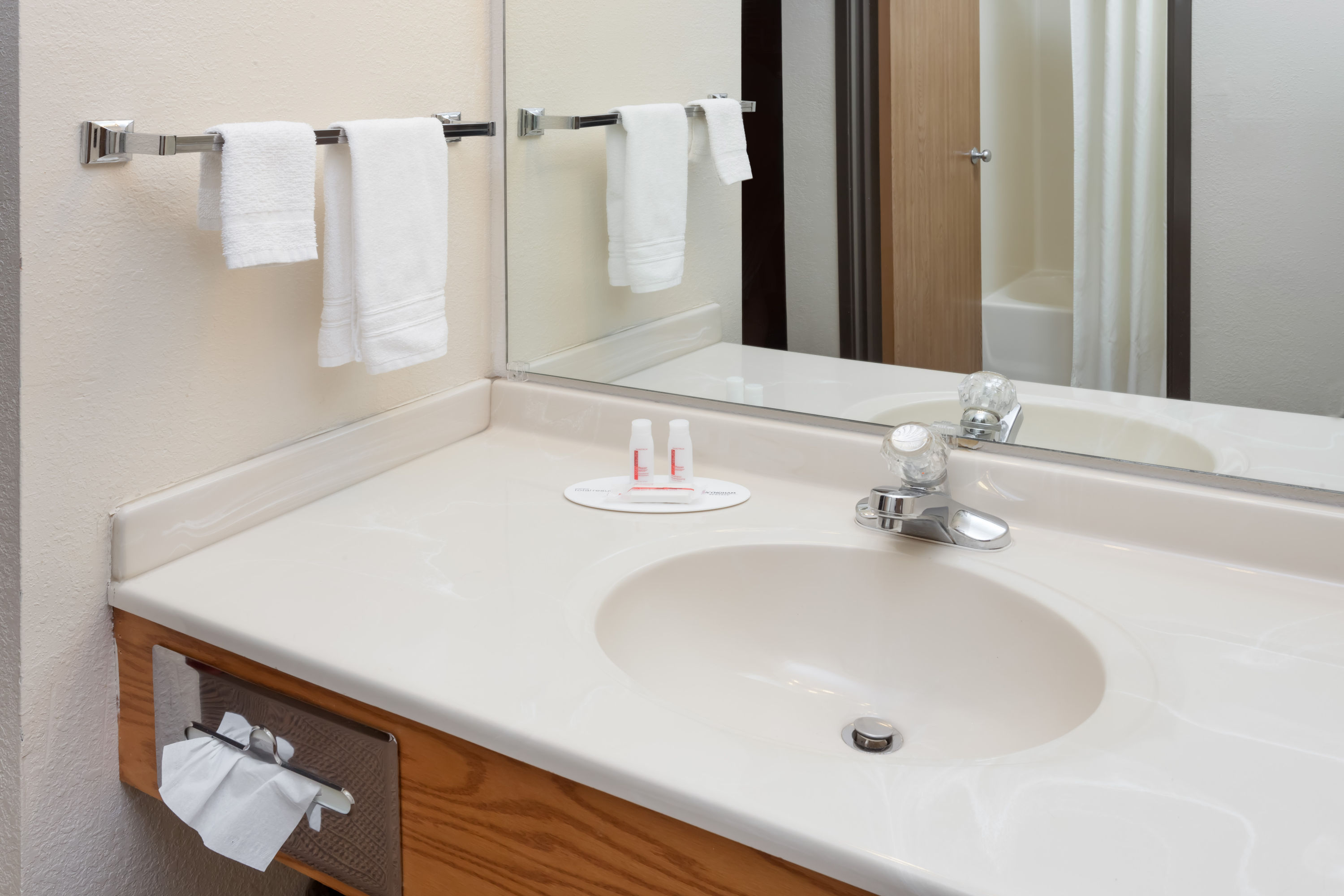 Guest room bath at the Super 8 by Wyndham Pekin/Peoria Area in Pekin, Illinois