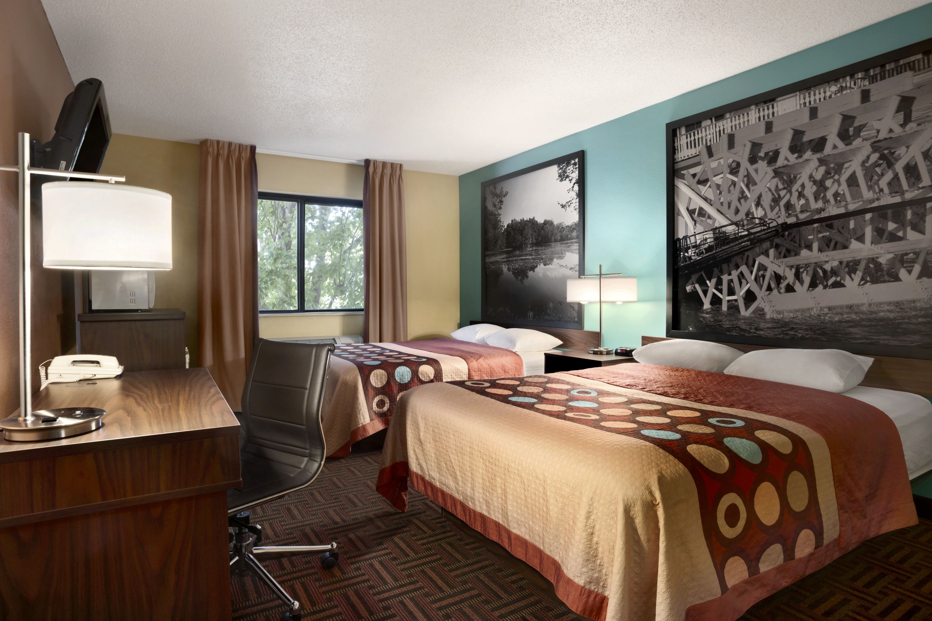Guest room at the Super 8 by Wyndham Peoria in Peoria, Illinois