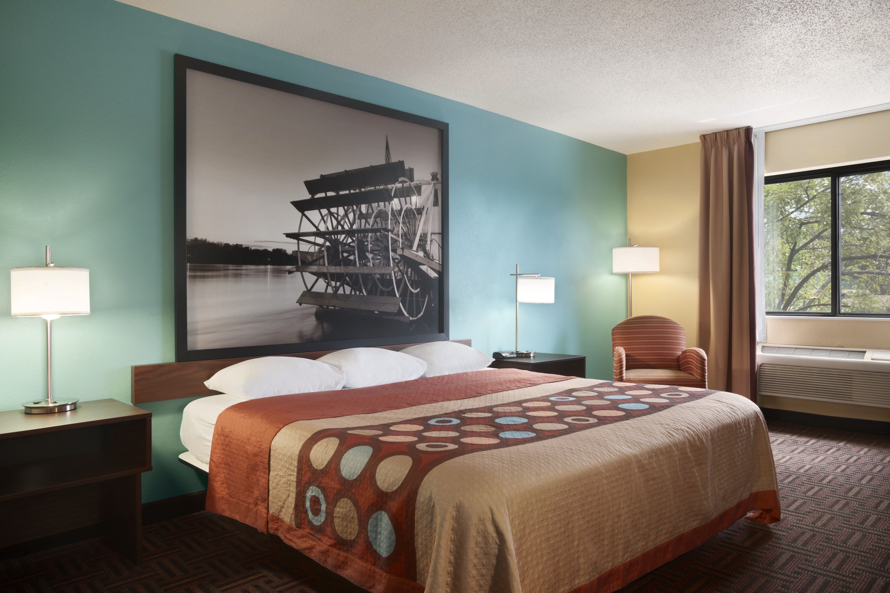 Guest room at the Super 8 by Wyndham Peoria in Peoria, Illinois