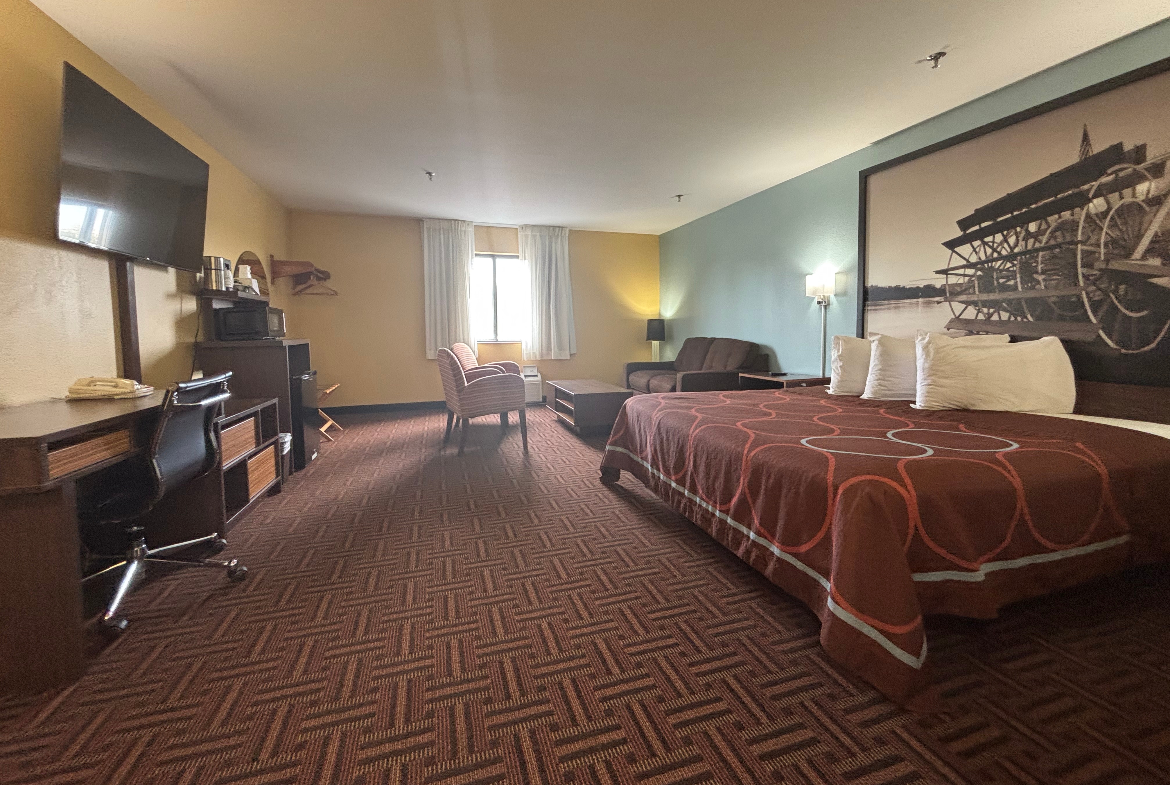 Guest room at the Super 8 by Wyndham Peoria in Peoria, Illinois