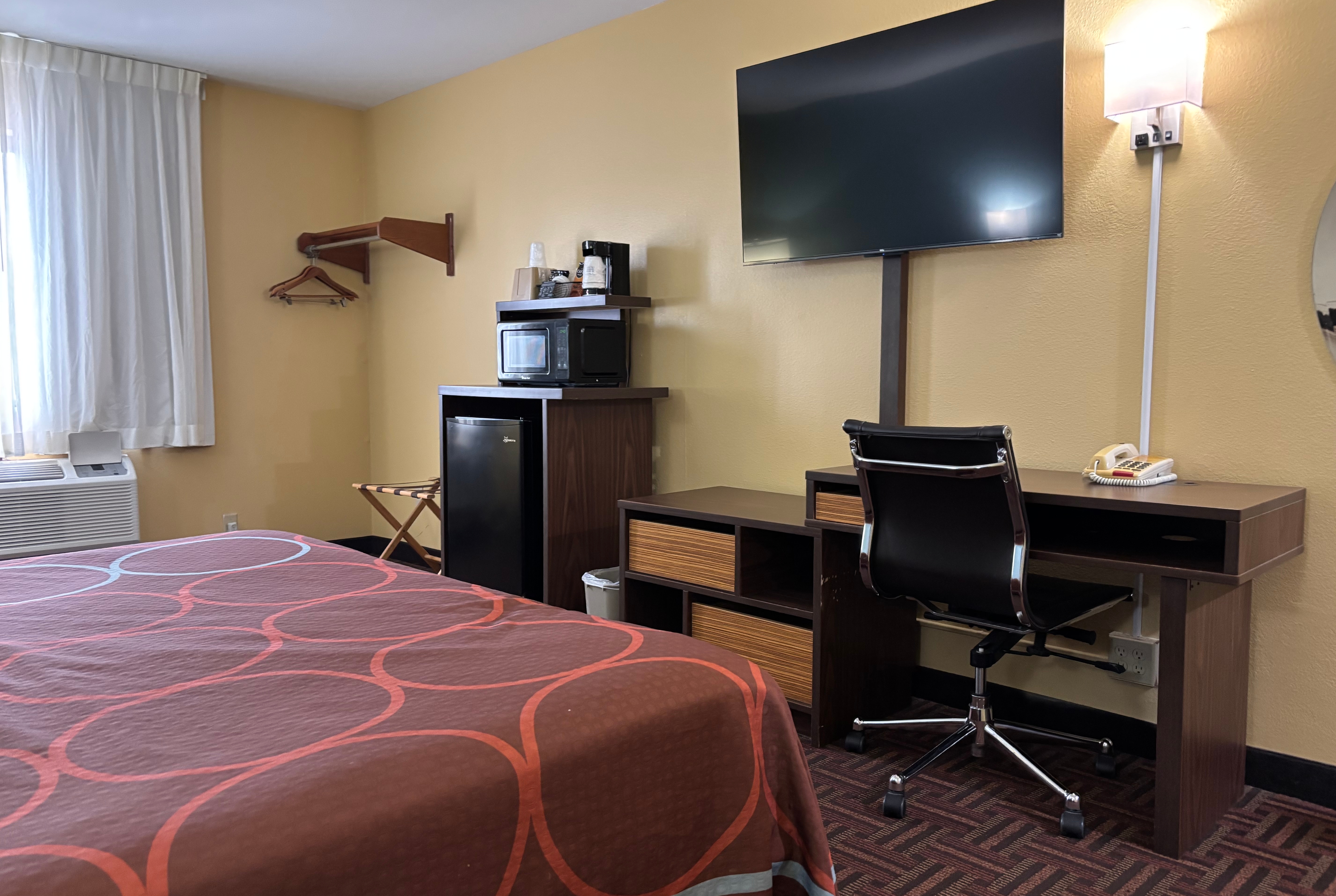 Guest room at the Super 8 by Wyndham Peoria in Peoria, Illinois