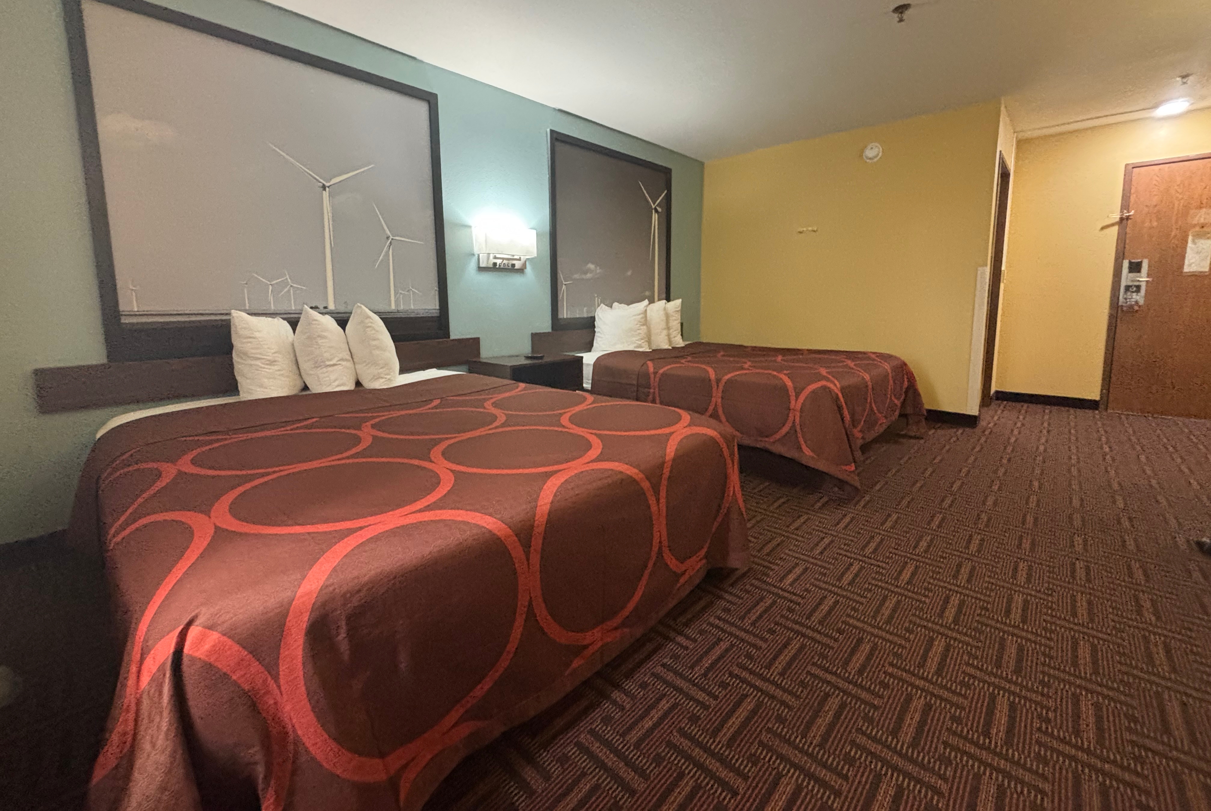 Guest room at the Super 8 by Wyndham Peoria in Peoria, Illinois