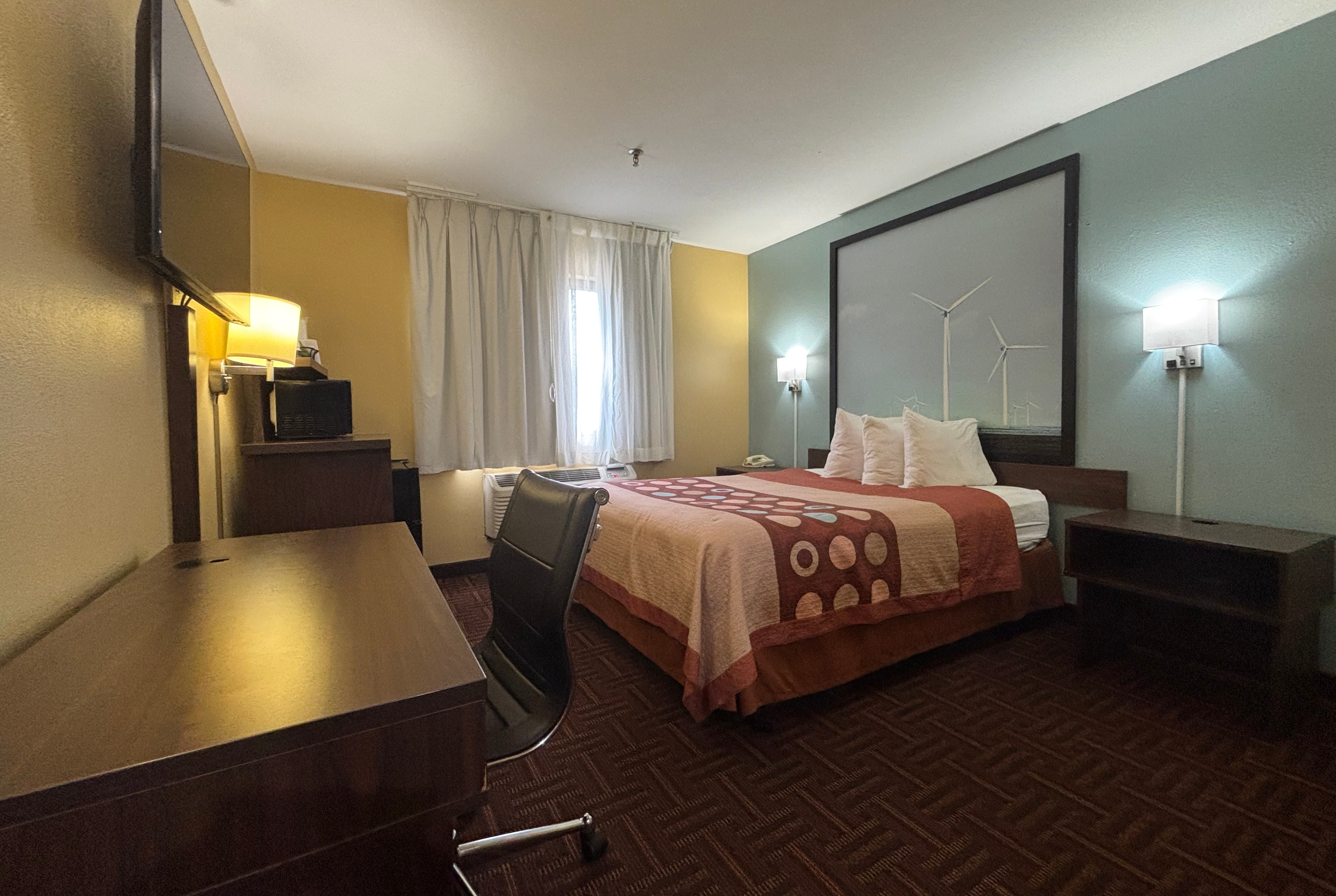 Guest room at the Super 8 by Wyndham Peoria in Peoria, Illinois