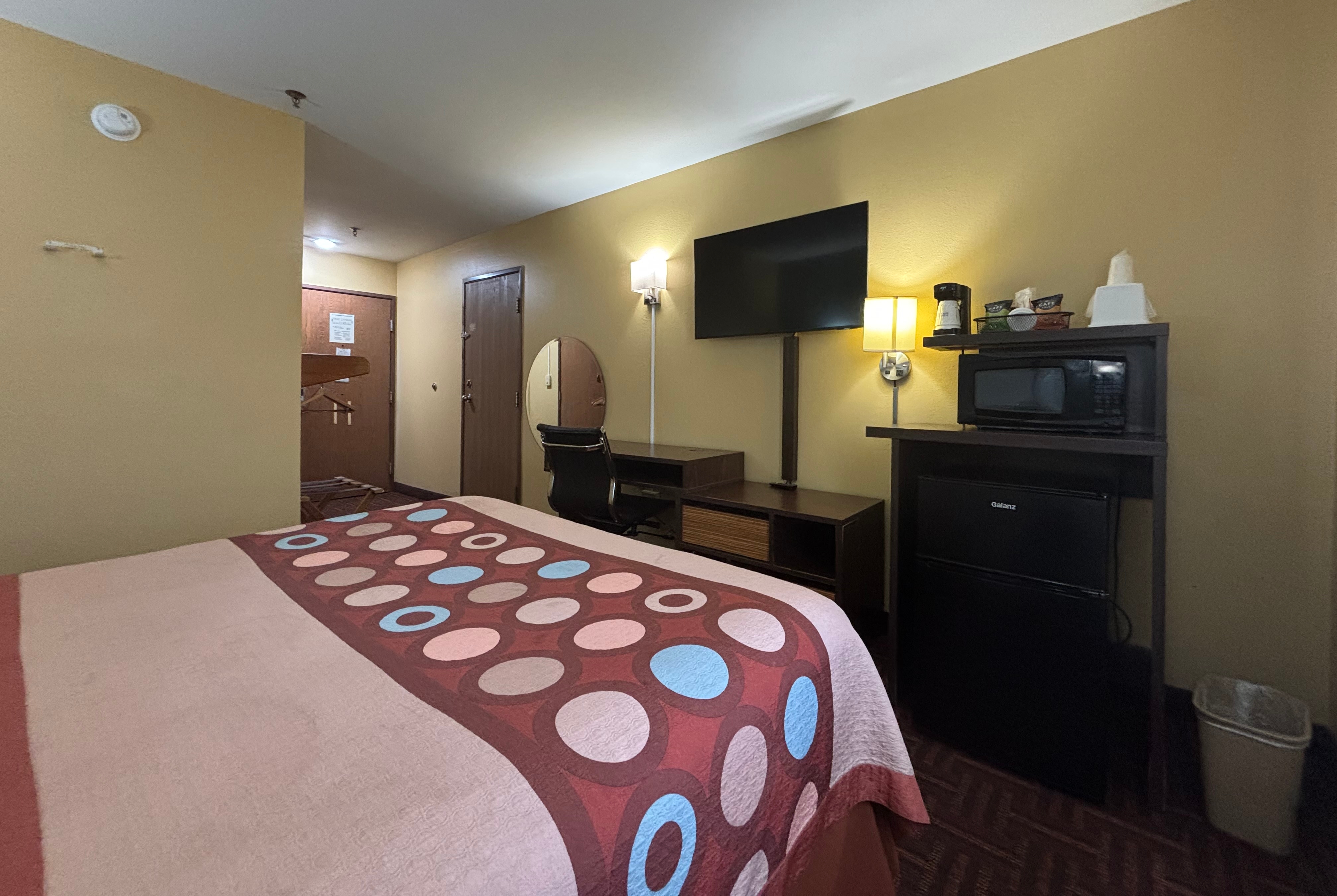 Guest room at the Super 8 by Wyndham Peoria in Peoria, Illinois