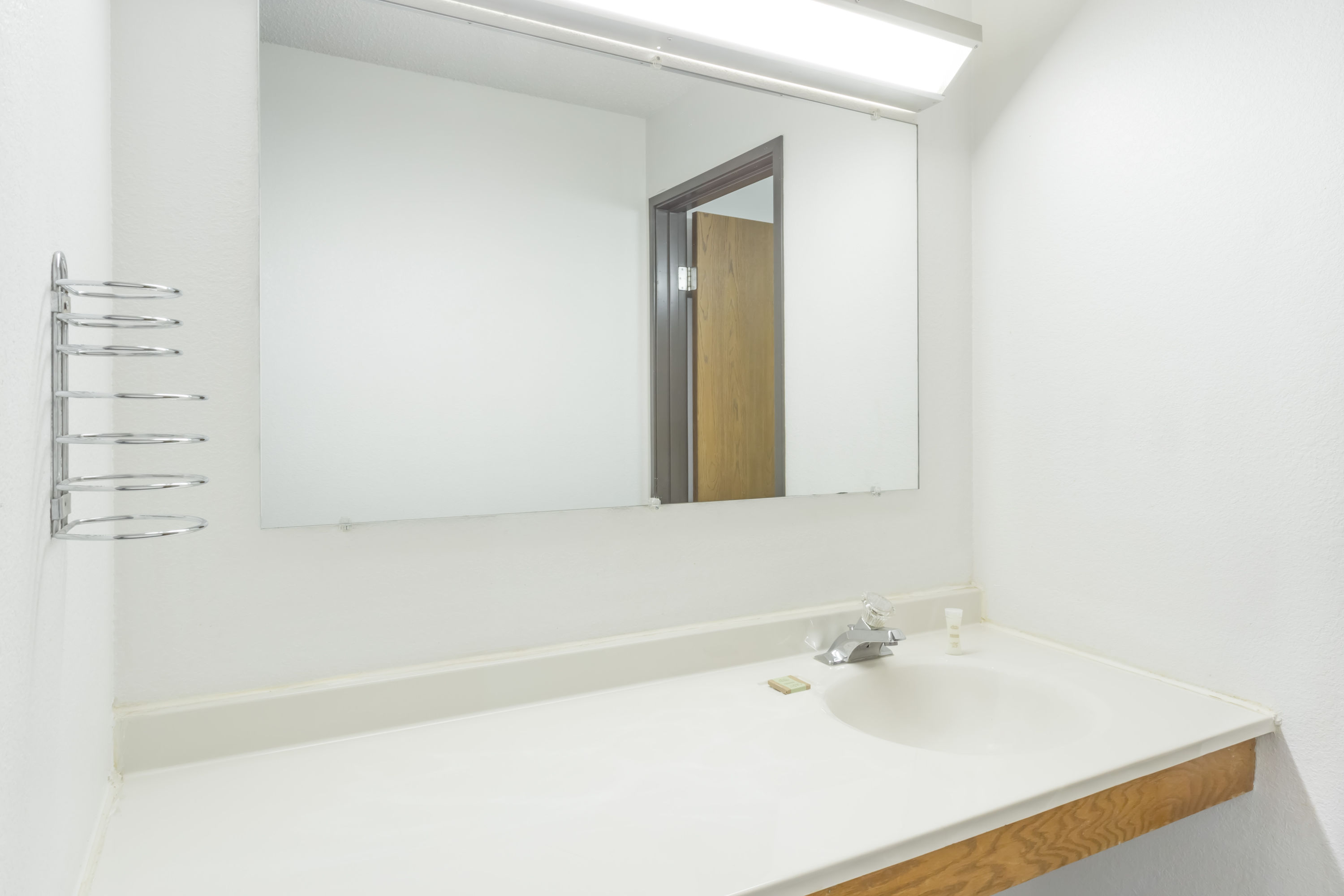 Guest room at the Super 8 by Wyndham Pontiac in Pontiac, Illinois