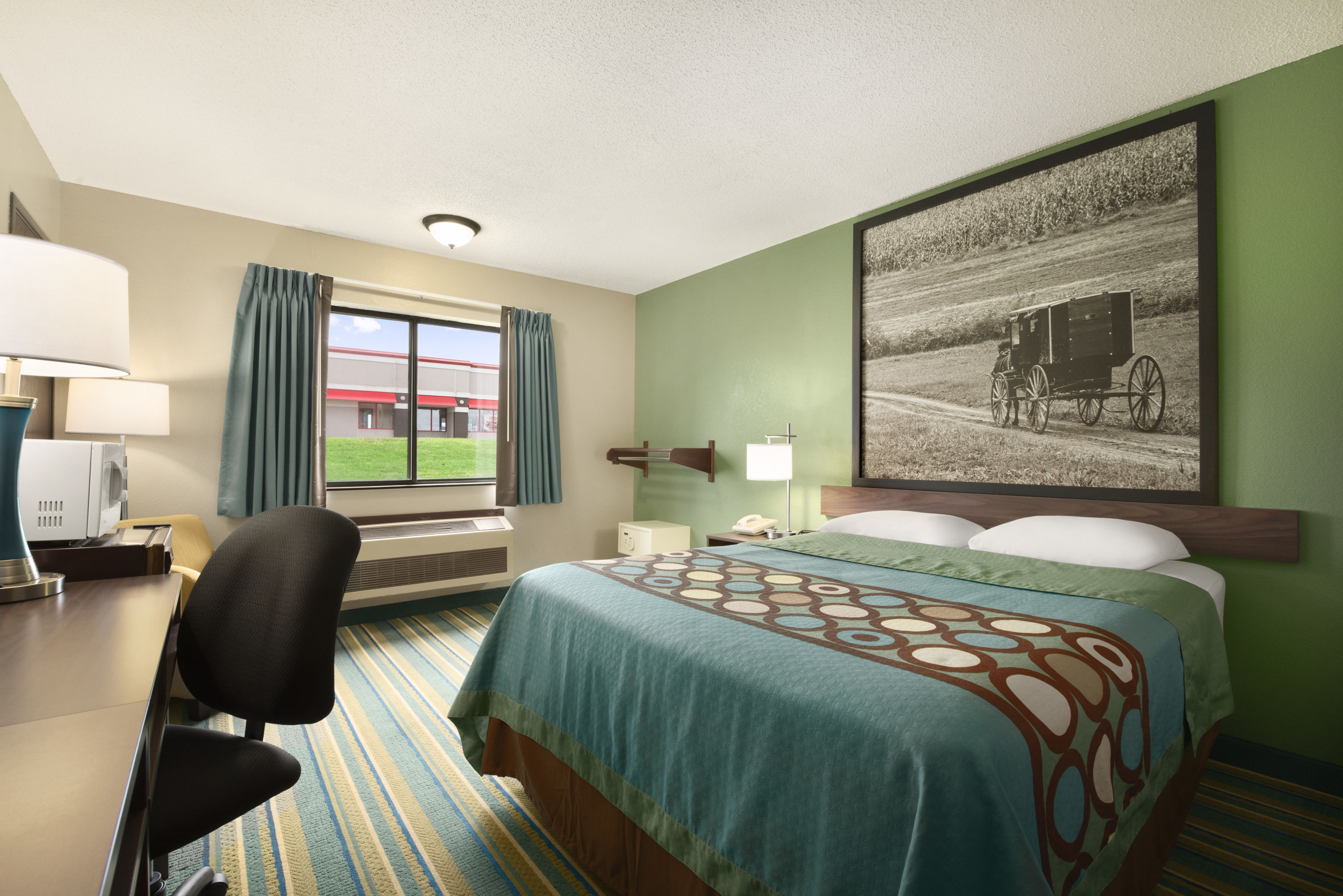 Guest room at the Super 8 by Wyndham Rantoul in Rantoul, Illinois