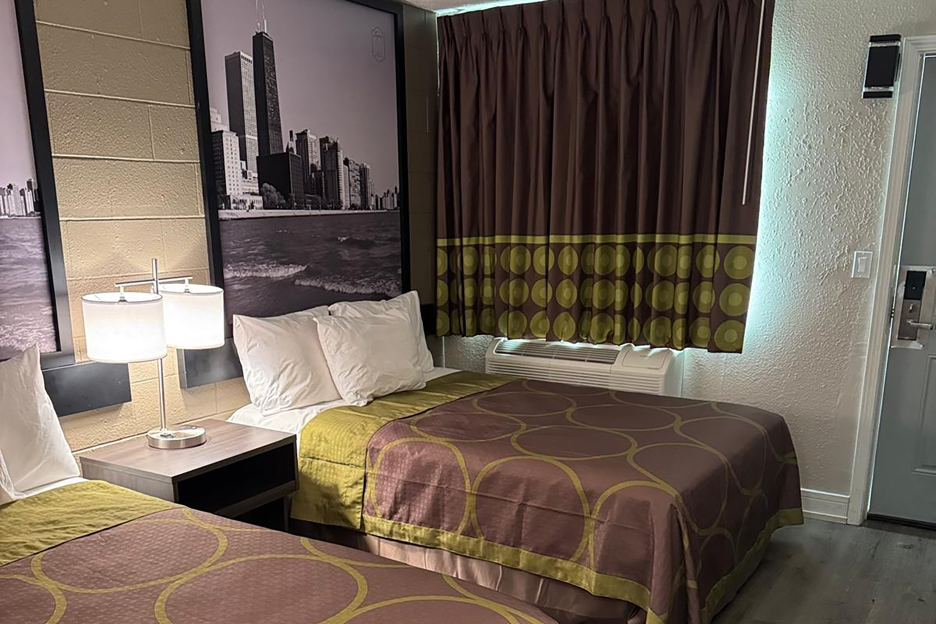 Guest room at the Super 8 by Wyndham Rockford South in Rockford, Illinois