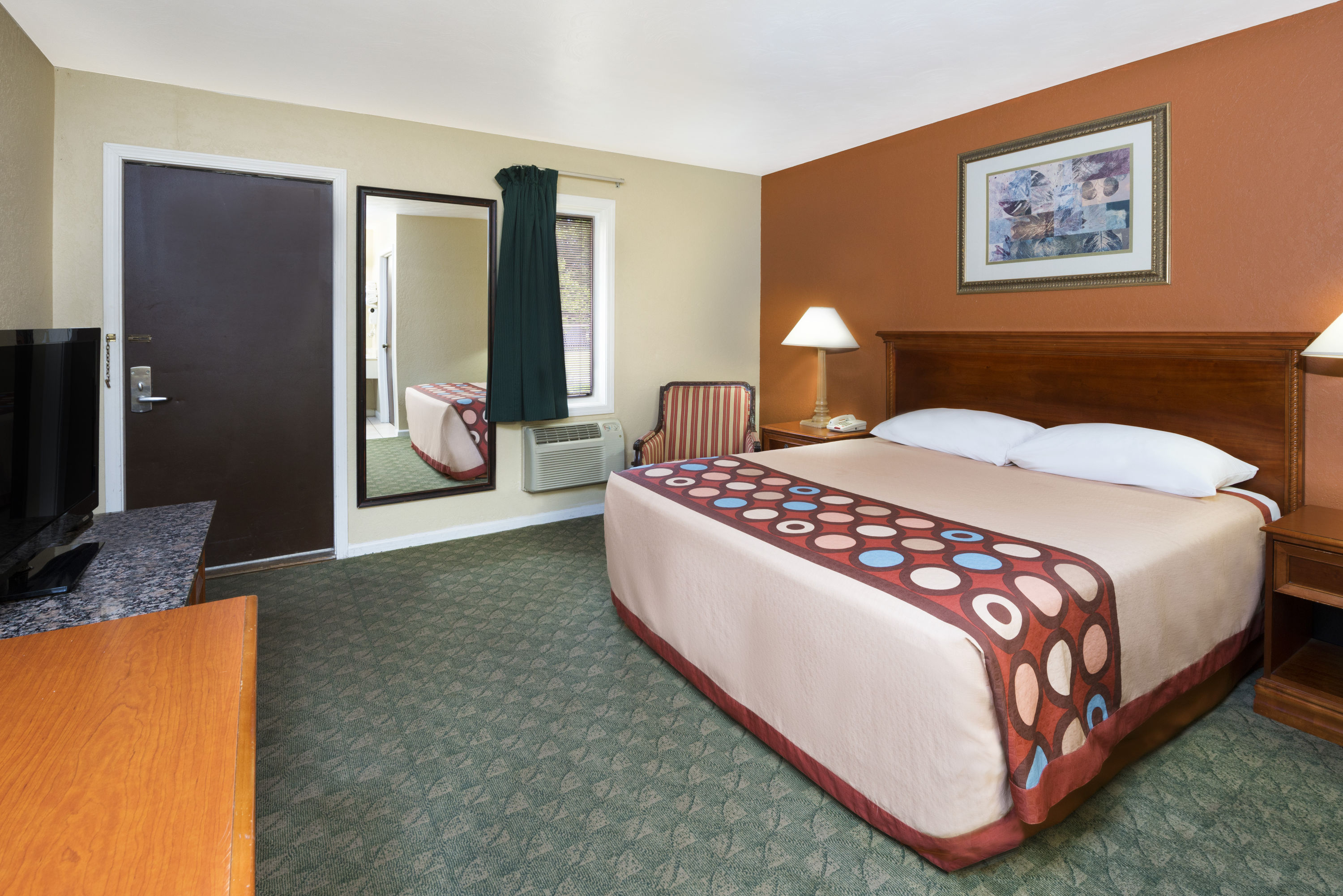 Guest room at the Super 8 by Wyndham Taylorville IL in Taylorville, Illinois