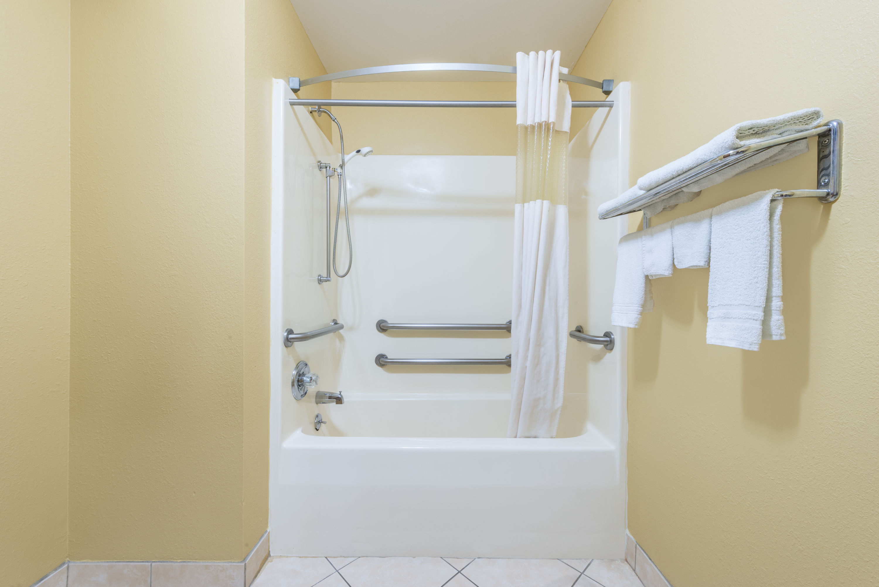 Guest room at the Super 8 by Wyndham Troy IL/St. Louis Area in Troy, Illinois